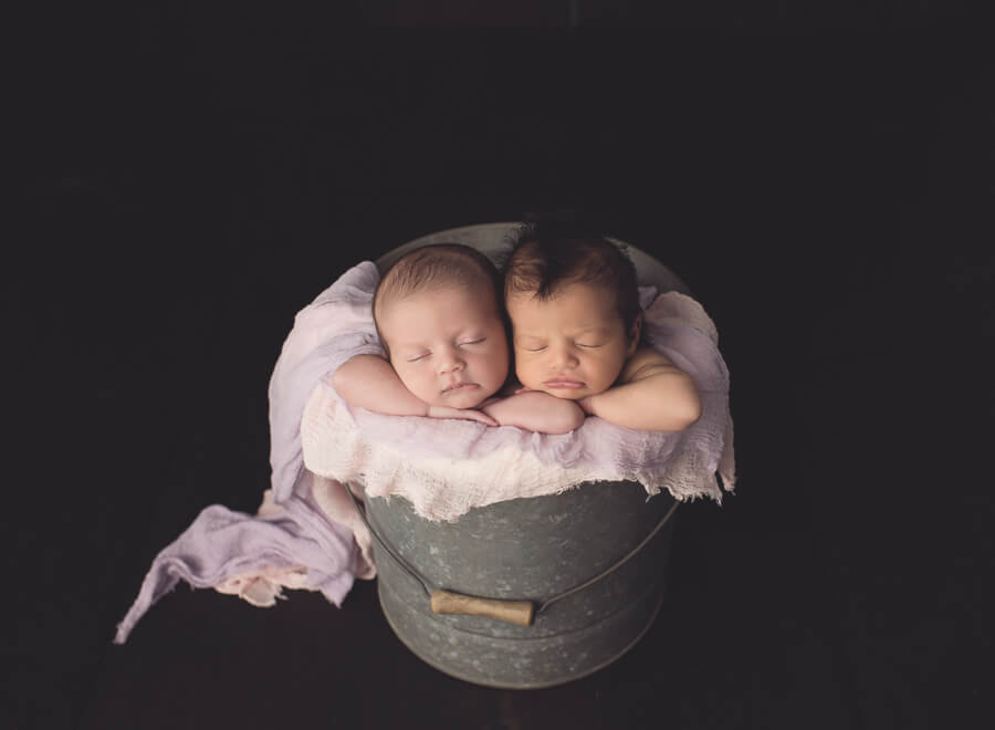 Melissa Hartigan Photography Connecticut Newborn Photographer twins baby girls in a bucket sleeping
