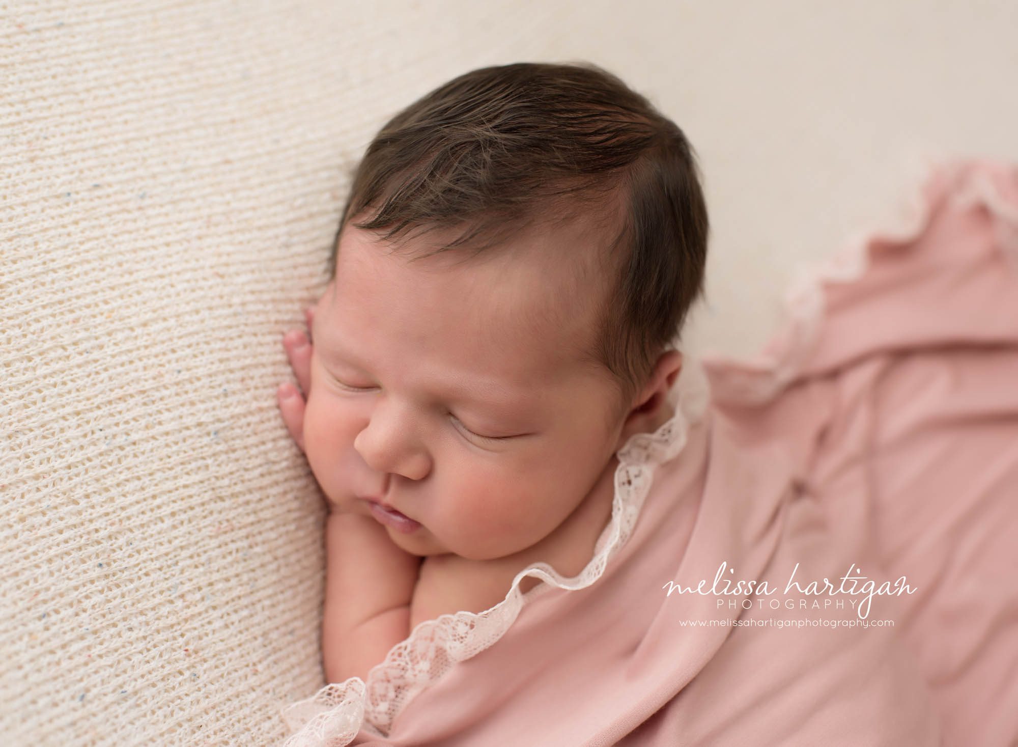 Melissa Hartigan Photography Connecticut Newborn Photographer trumbull Ct baby Fairfield county Baby girl pink wrap on pink blanket sleeping CT mini newborn session close up