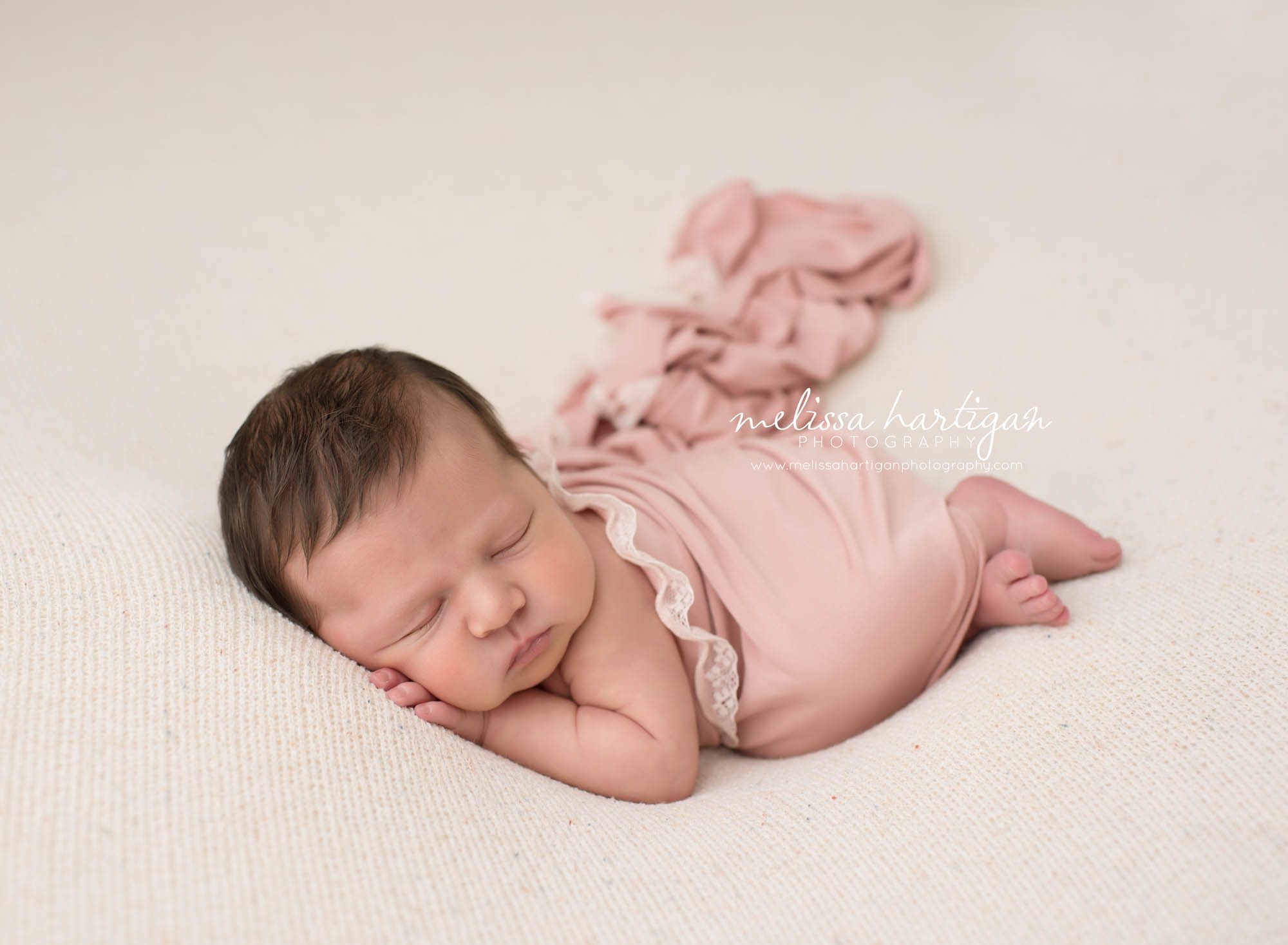 Melissa Hartigan Photography Connecticut Newborn Photographer trumbull Ct baby Fairfield county Baby girl pink wrap on pink blanket sleeping CT mini newborn session
