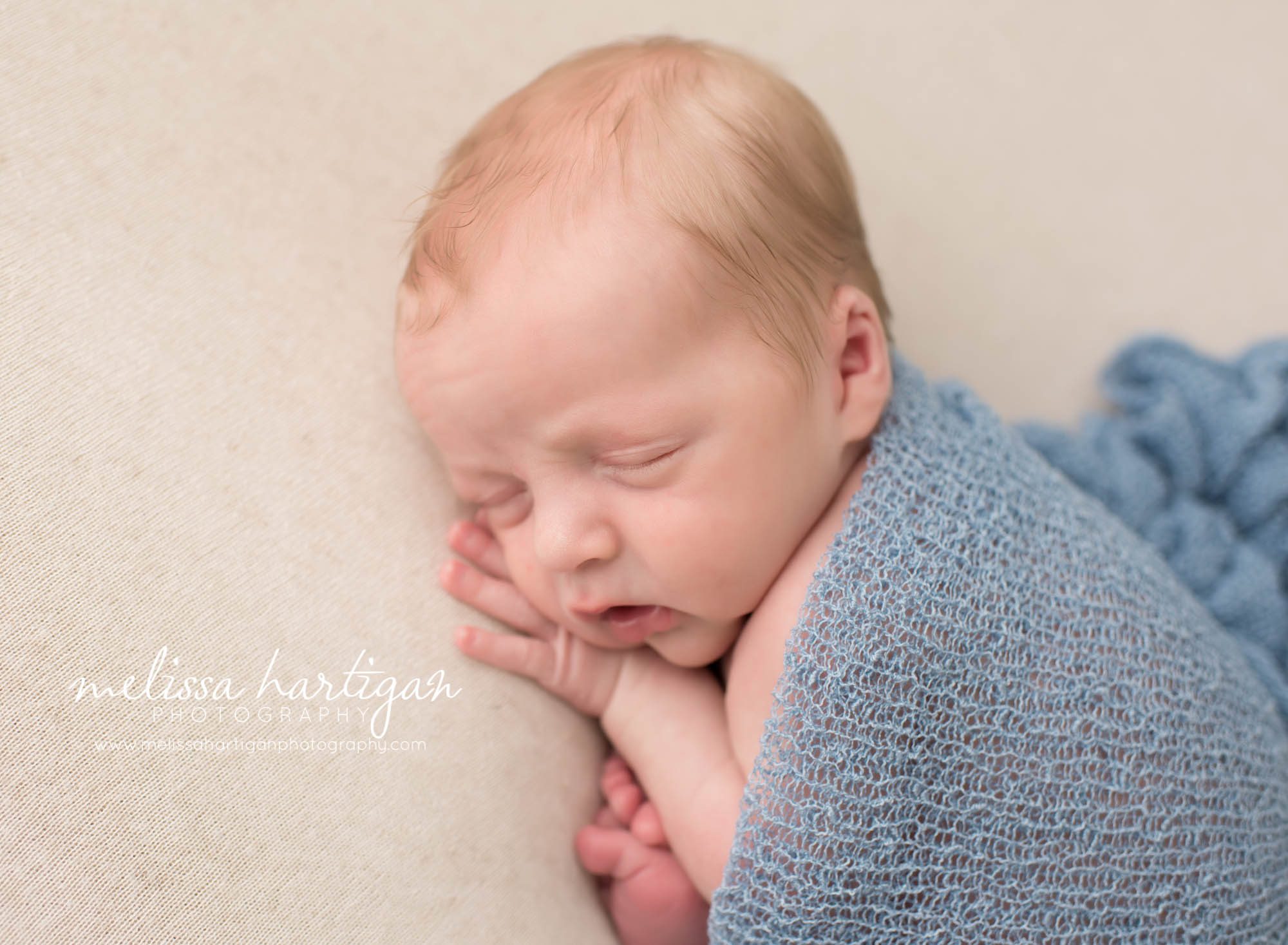 Melissa Hartigan Photography Connecticut Newborn Twin Photographer Coventry Ct Middlefield CT baby Fairfield county Newborn and maternity CT photographer Newborn twin photographer baby boy sleeping with blue wrap head on hands