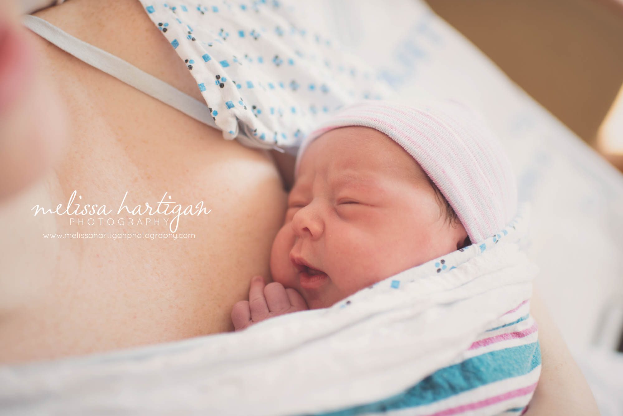 Melissa Hartigan Photography Connecticut Maternity and Newborn Photographer Piper Fresh 48 Newborn Session Mom holding baby on chest under blanket close up