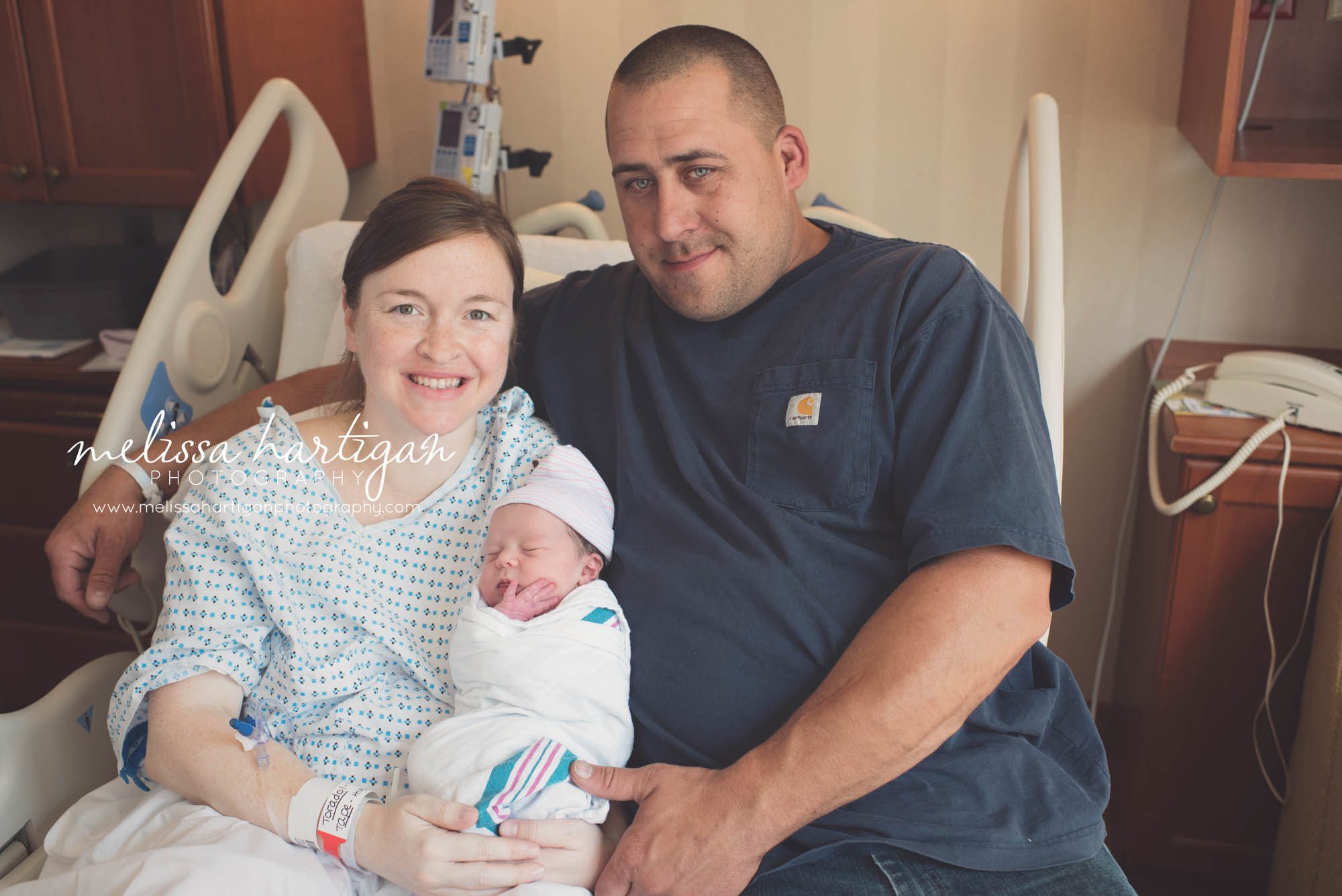 Melissa Hartigan Photography Connecticut Maternity and Newborn Photographer Piper Fresh 48 Newborn Session parents holding new baby girl in hospital