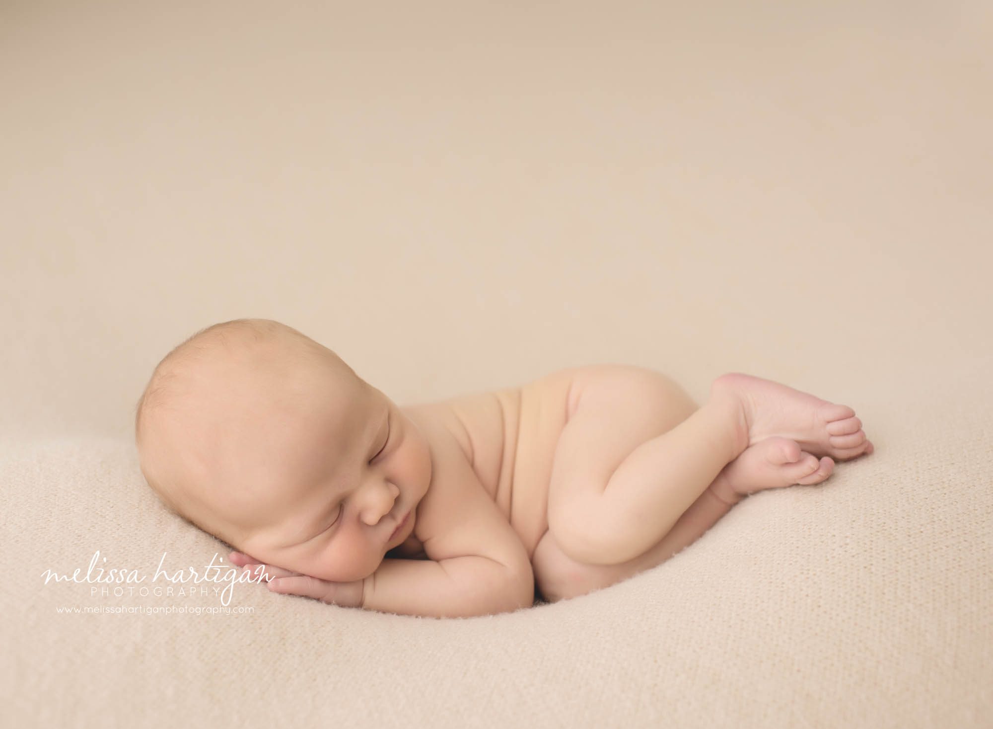 Melissa Hartigan Photography CT Newborn Photographer Braeden Newborn Session baby boy sleeping naked with head on hands side pose