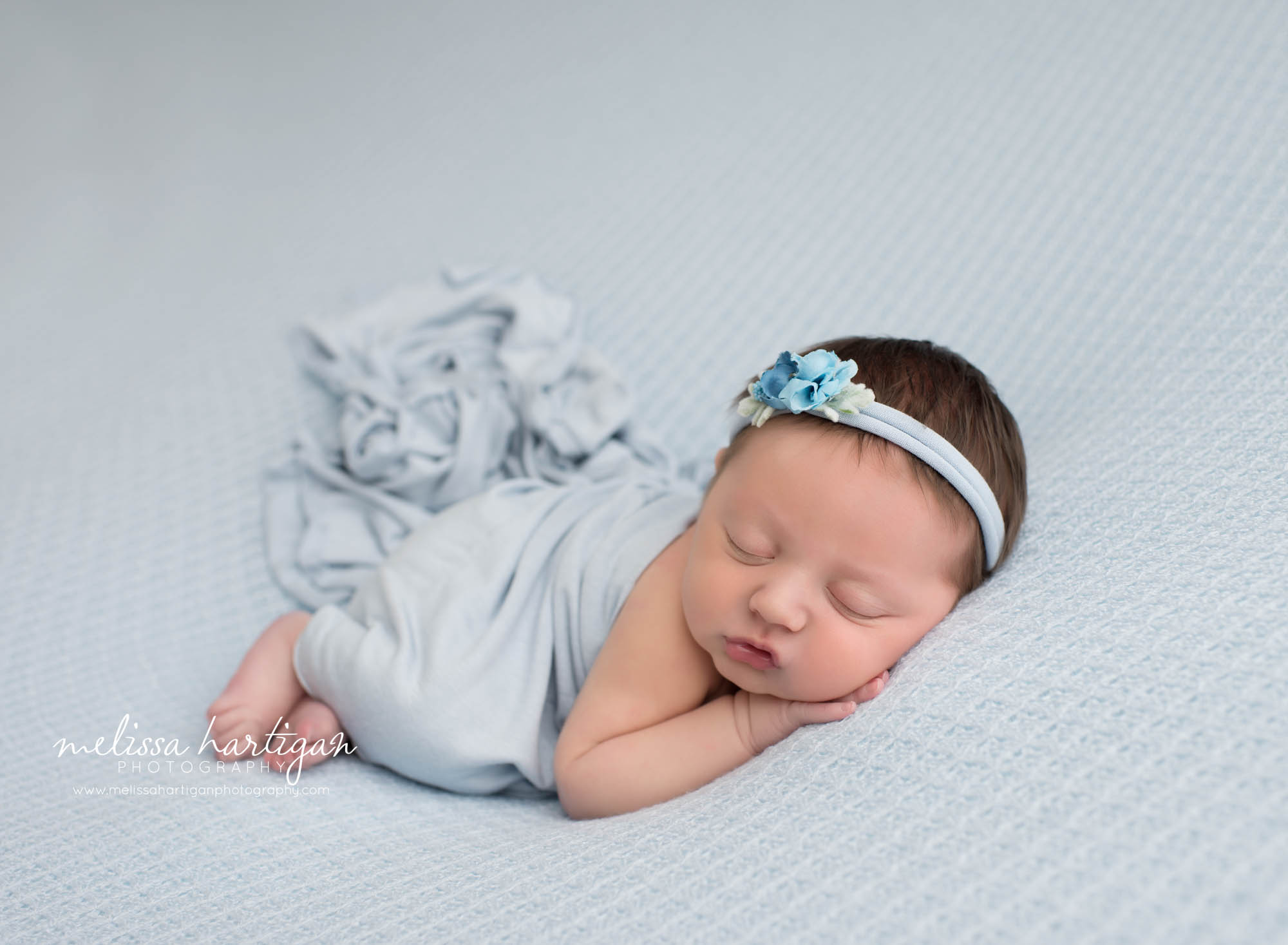 Leila CT Newborn Session baby girl sleeping on blue blanket