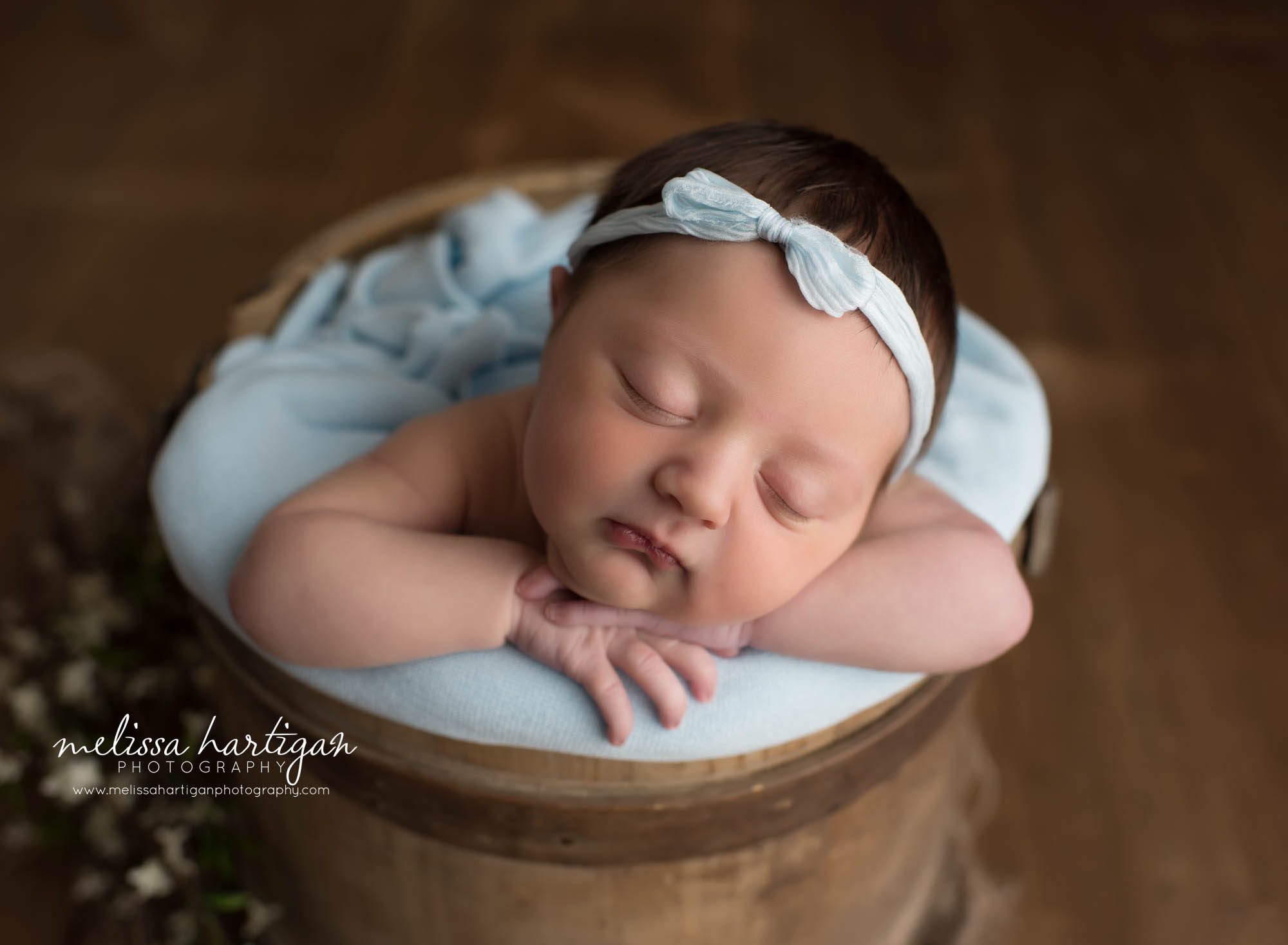 Leila CT Newborn Session baby girl sleeping in wooden bucket