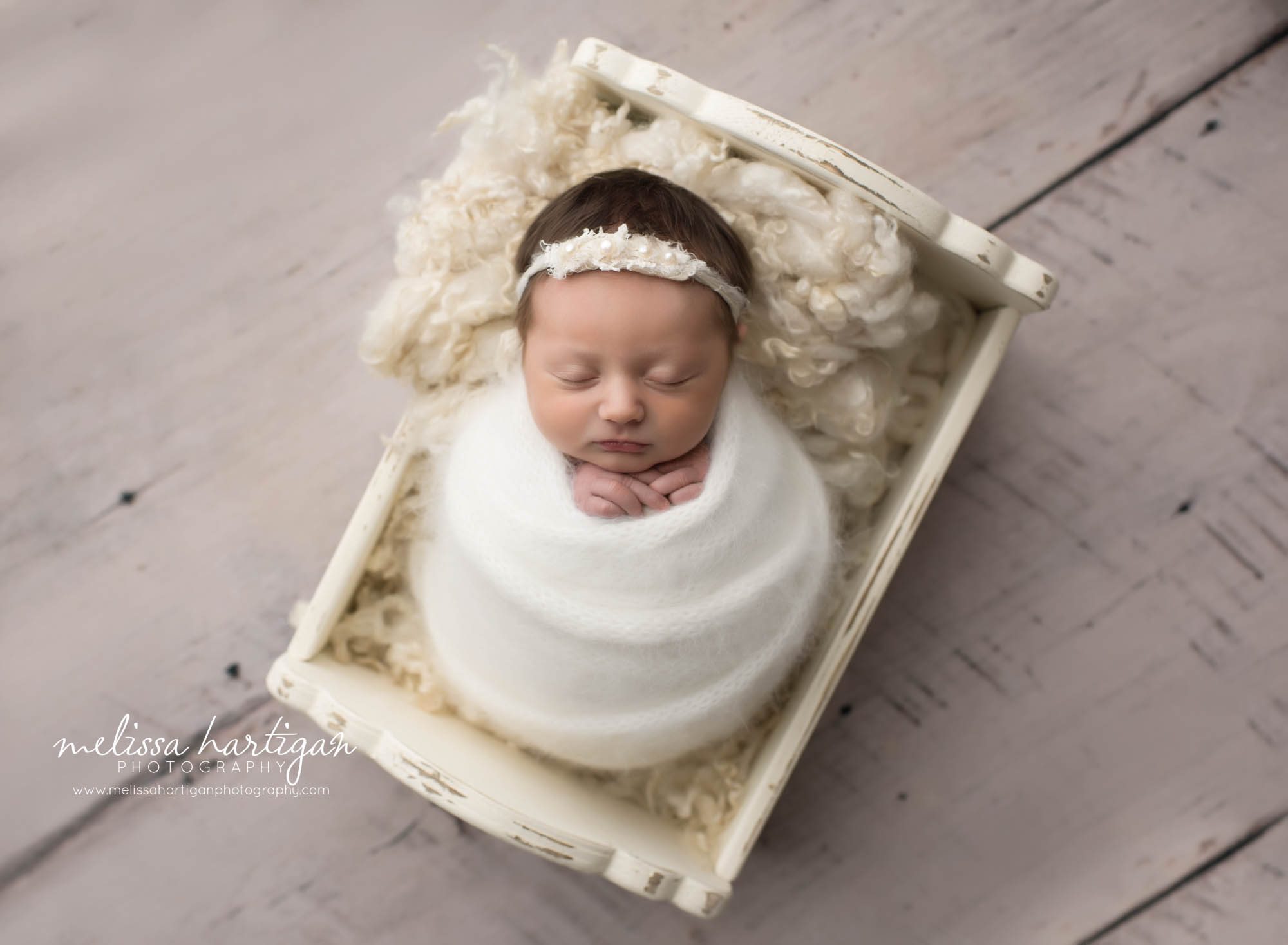 Leila CT Newborn Session baby girl sleeping in white wooden bed