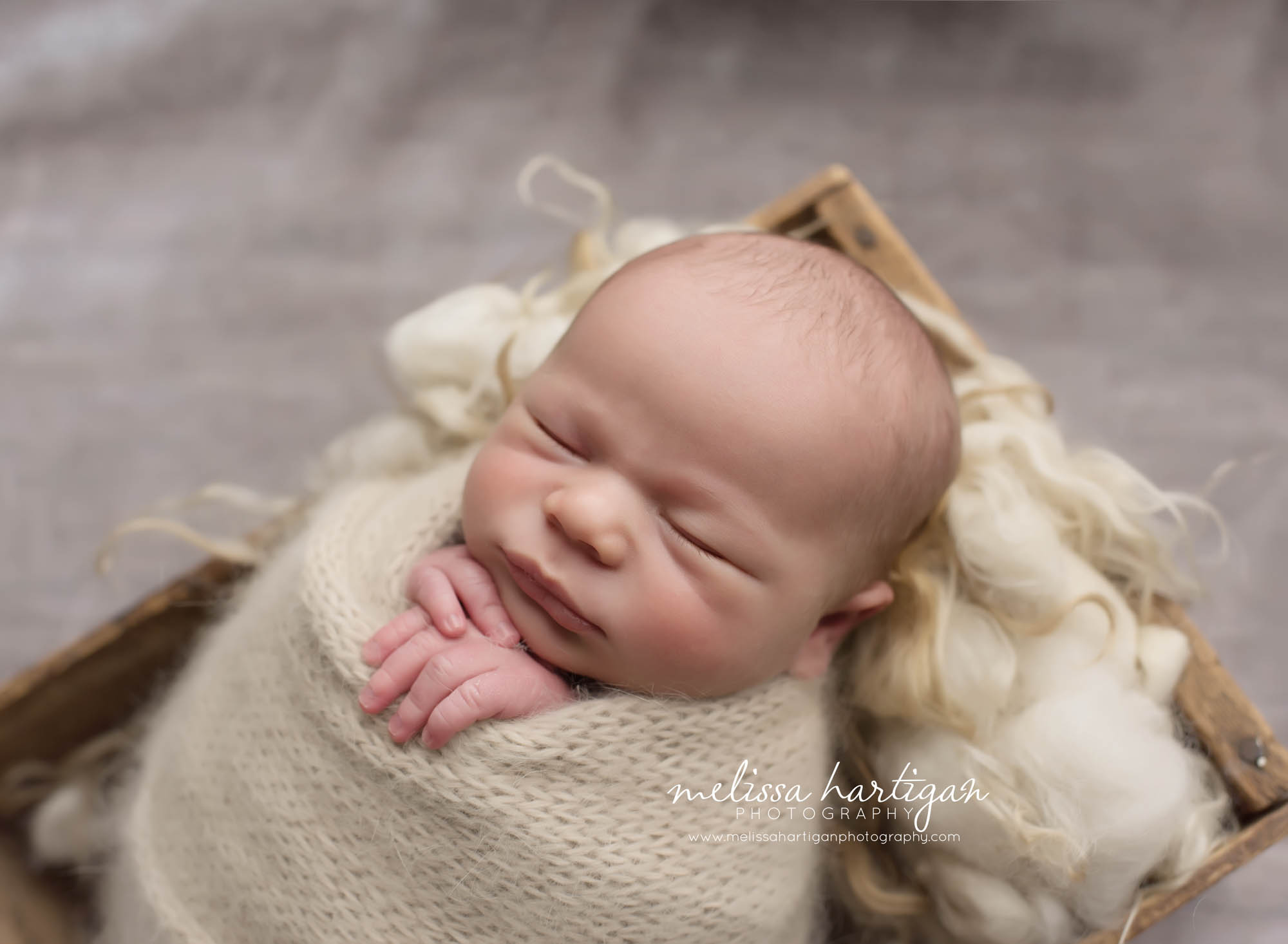 Newborn Session CT baby boy sleeping in wooden crate wrapped tan wrap