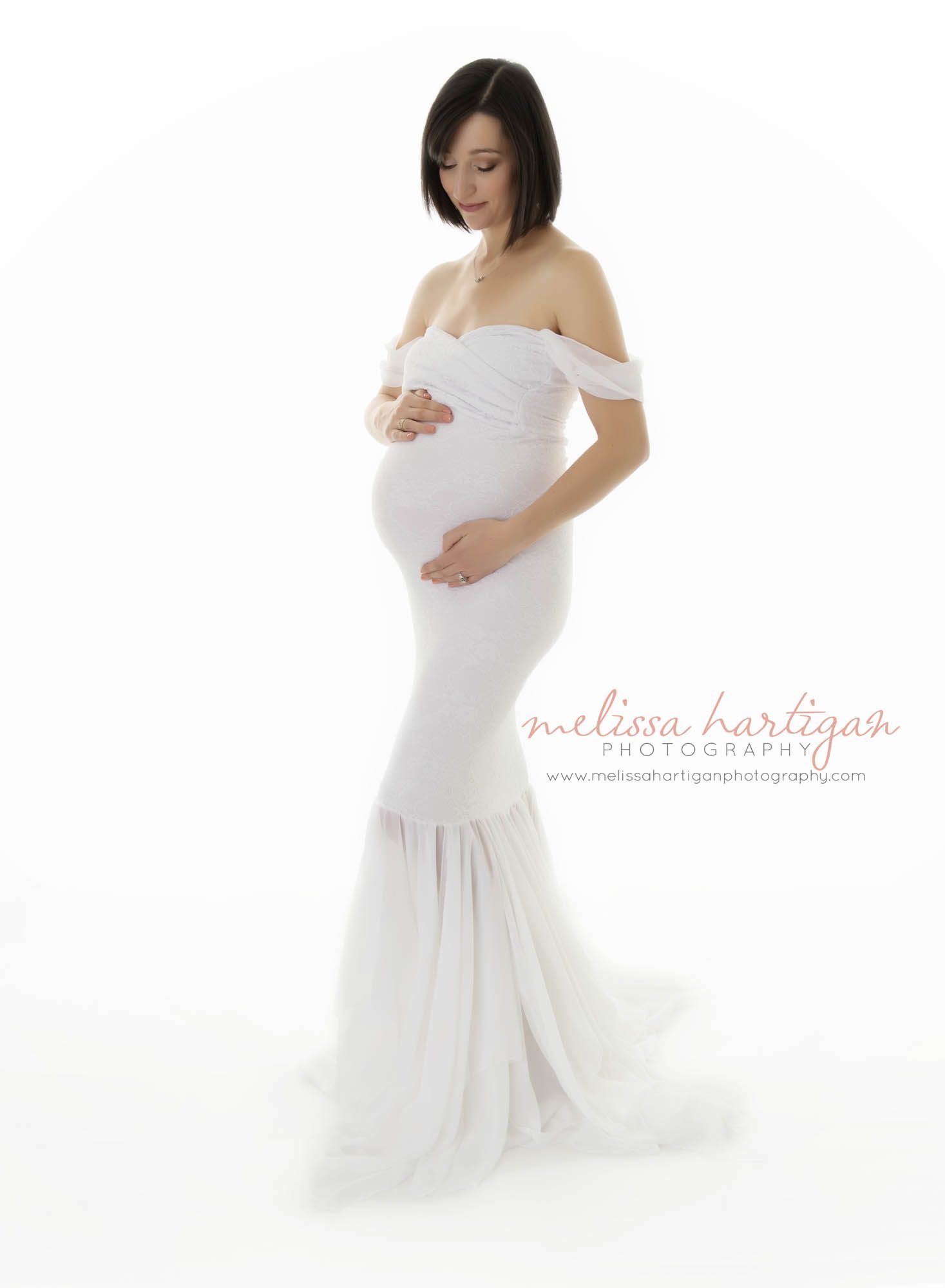 Pregnant mom standing pose in white dress CT Maternity Photographer