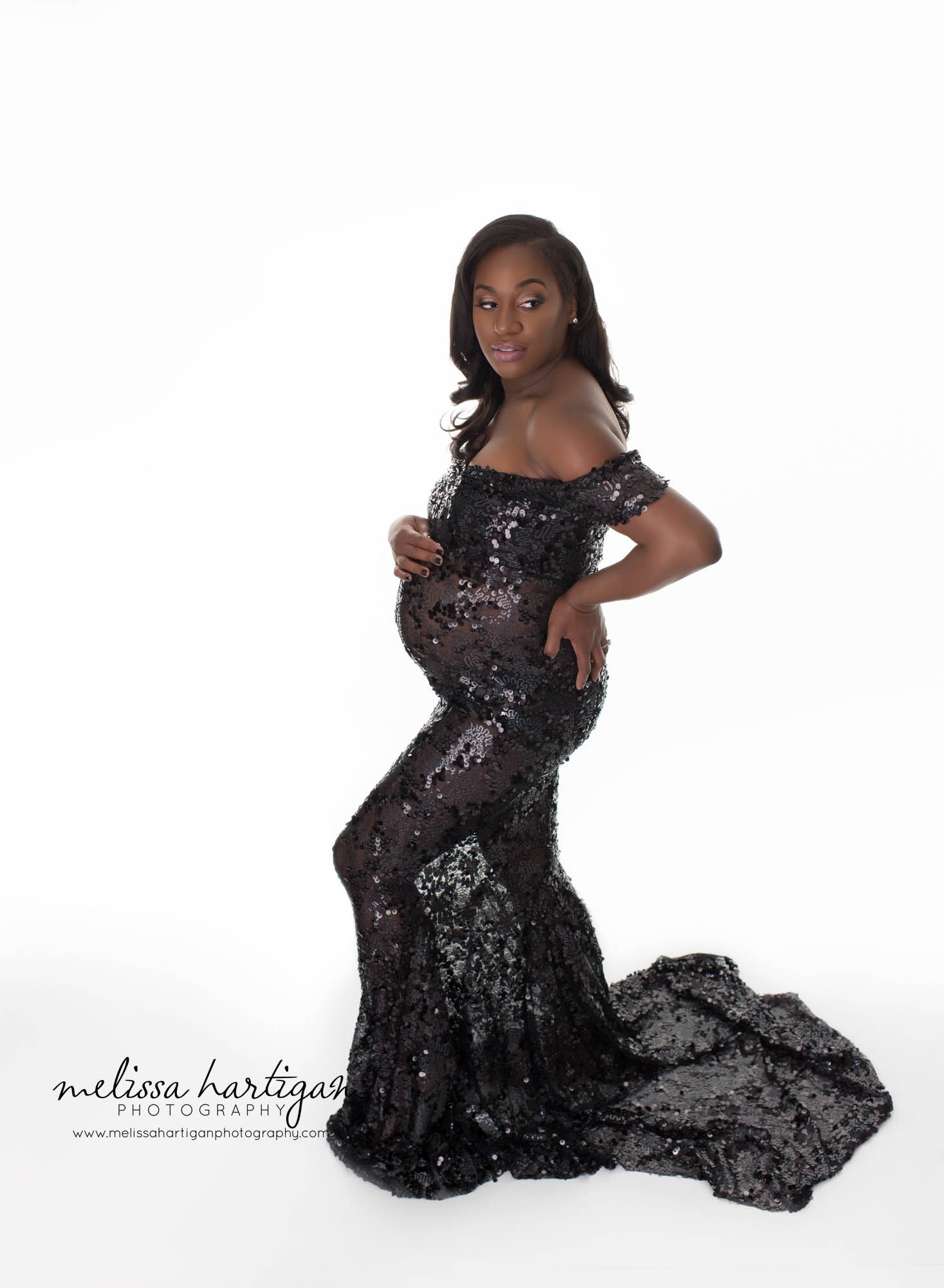 CT Newborn and Maternity Photographer maternity pose wearing long black sequined dress