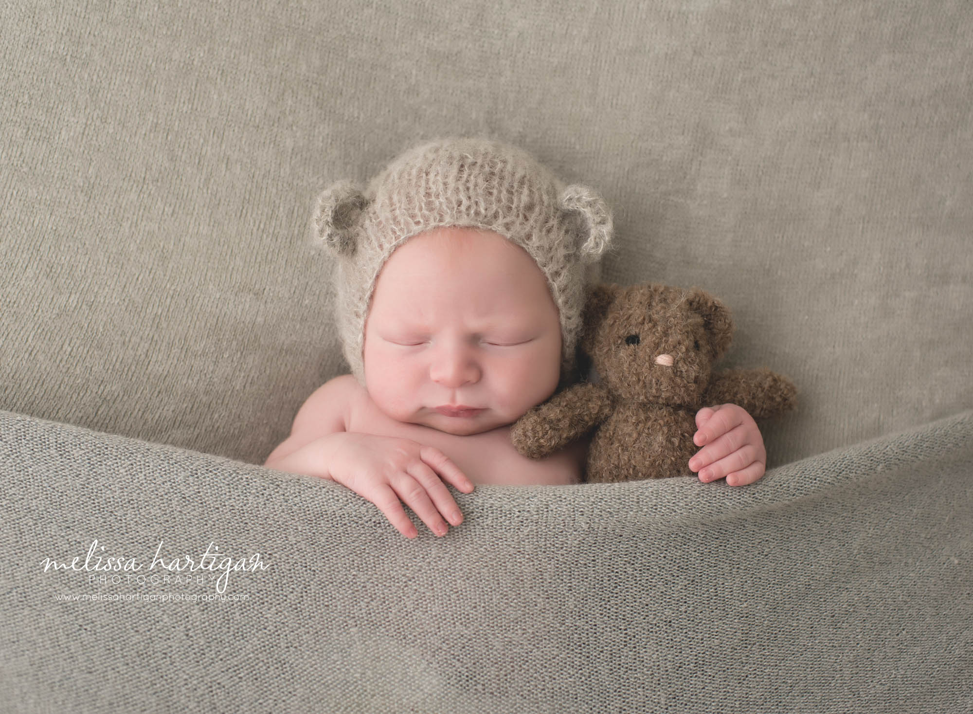 Newborn Photographer CT newborn pose baby sleeping with teddy