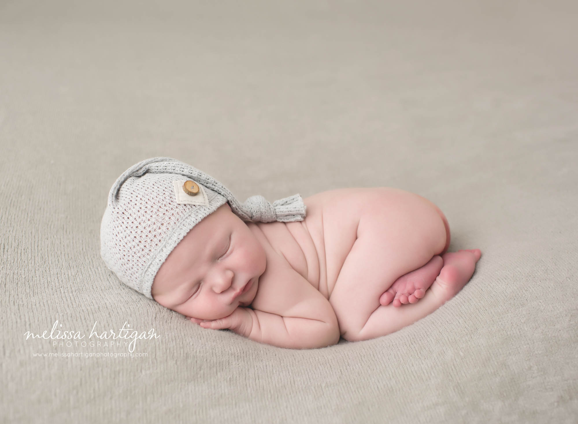 Newborn Photography CT newborn pose sleeping with cap