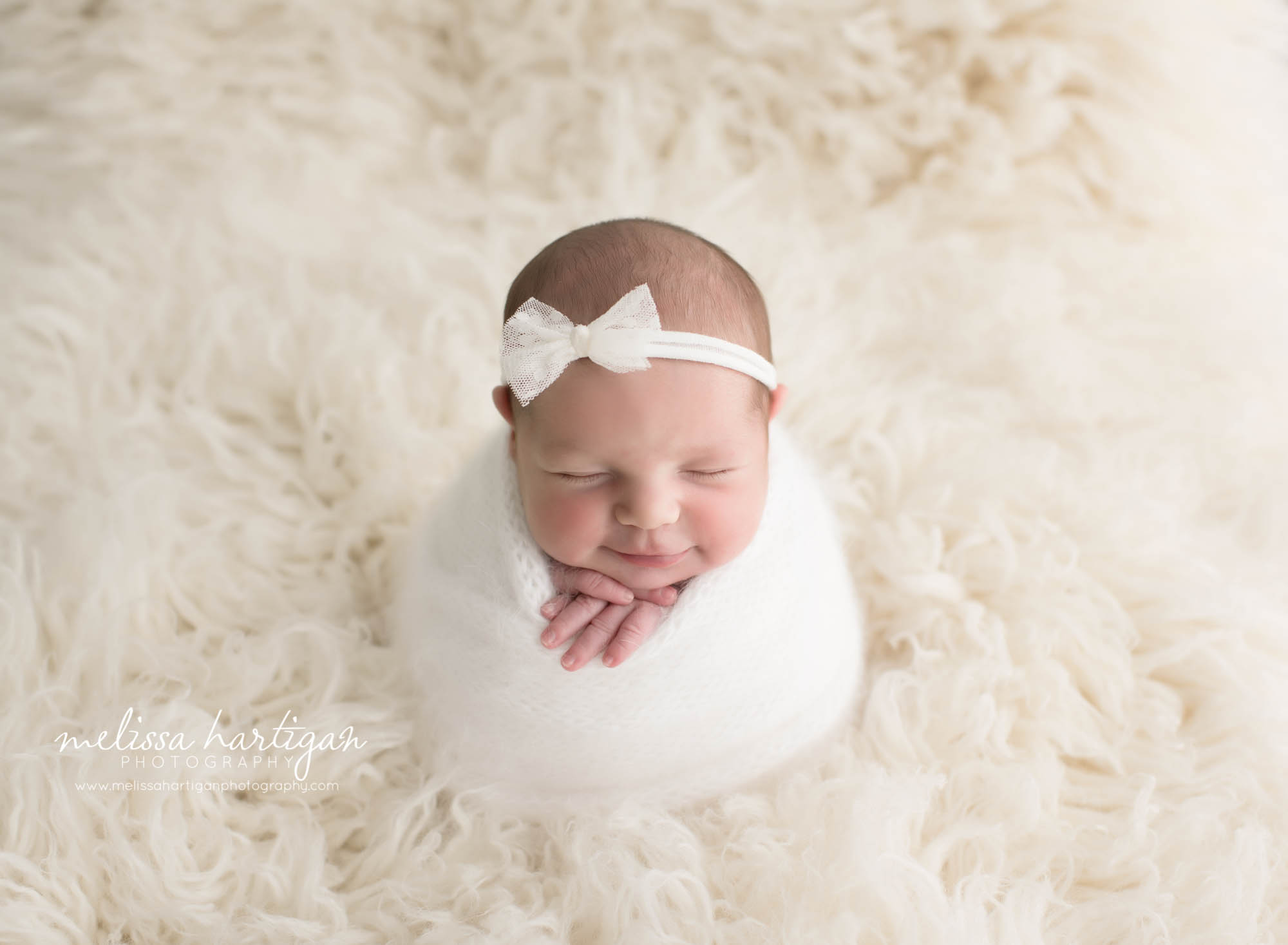 Connecticut Newborn Photographer baby girl in white wrap