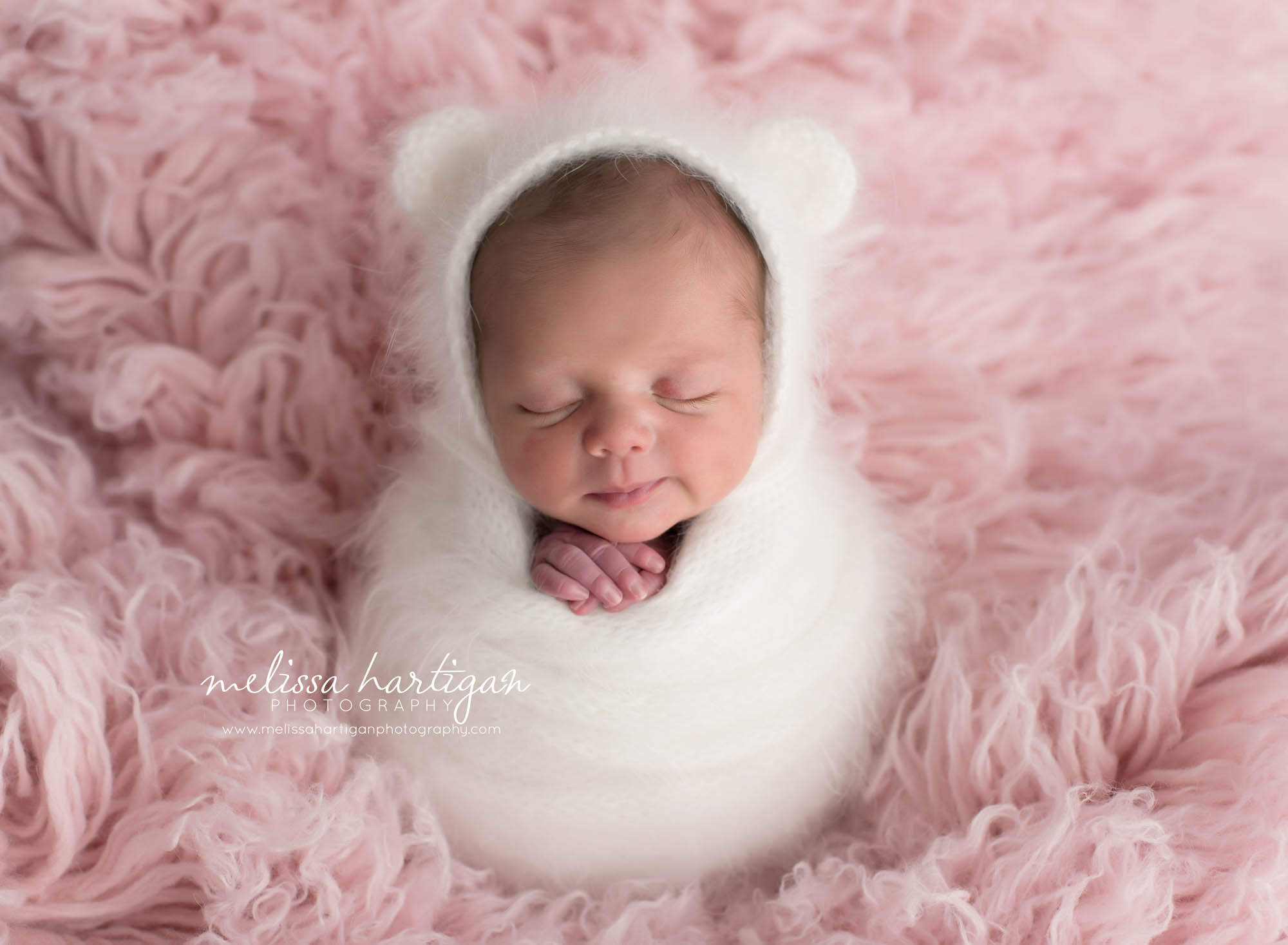 CT Baby Photographer baby girl wrapped with hat with ears