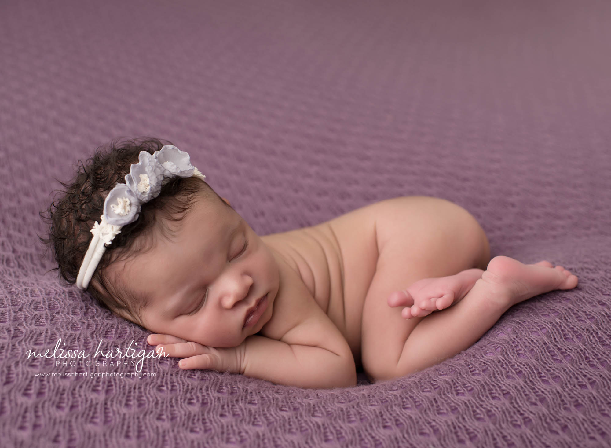 baby girl posed bum up newborn photography studio session