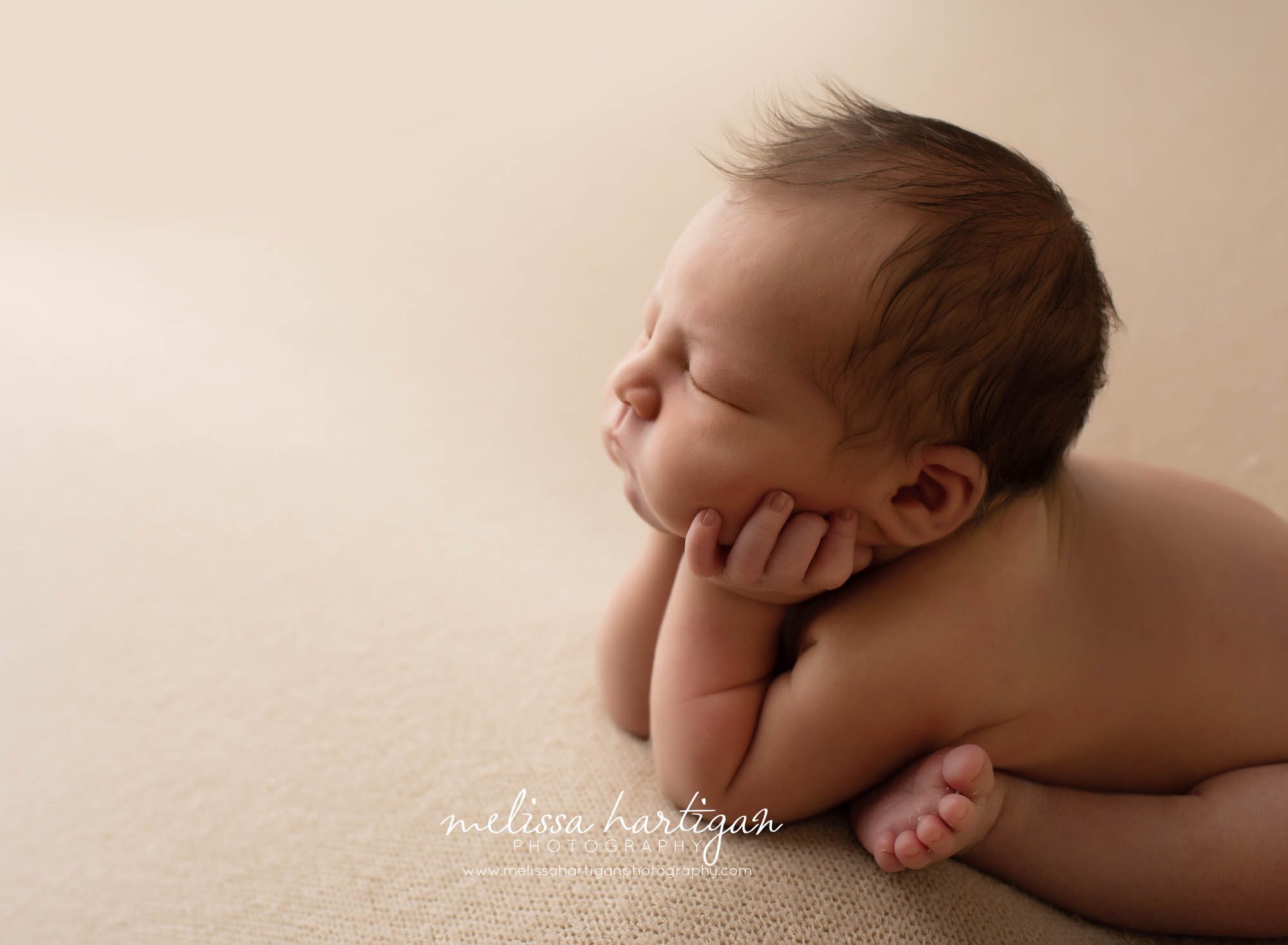 Baby boy posed froggy pose side view CT newborn photographer