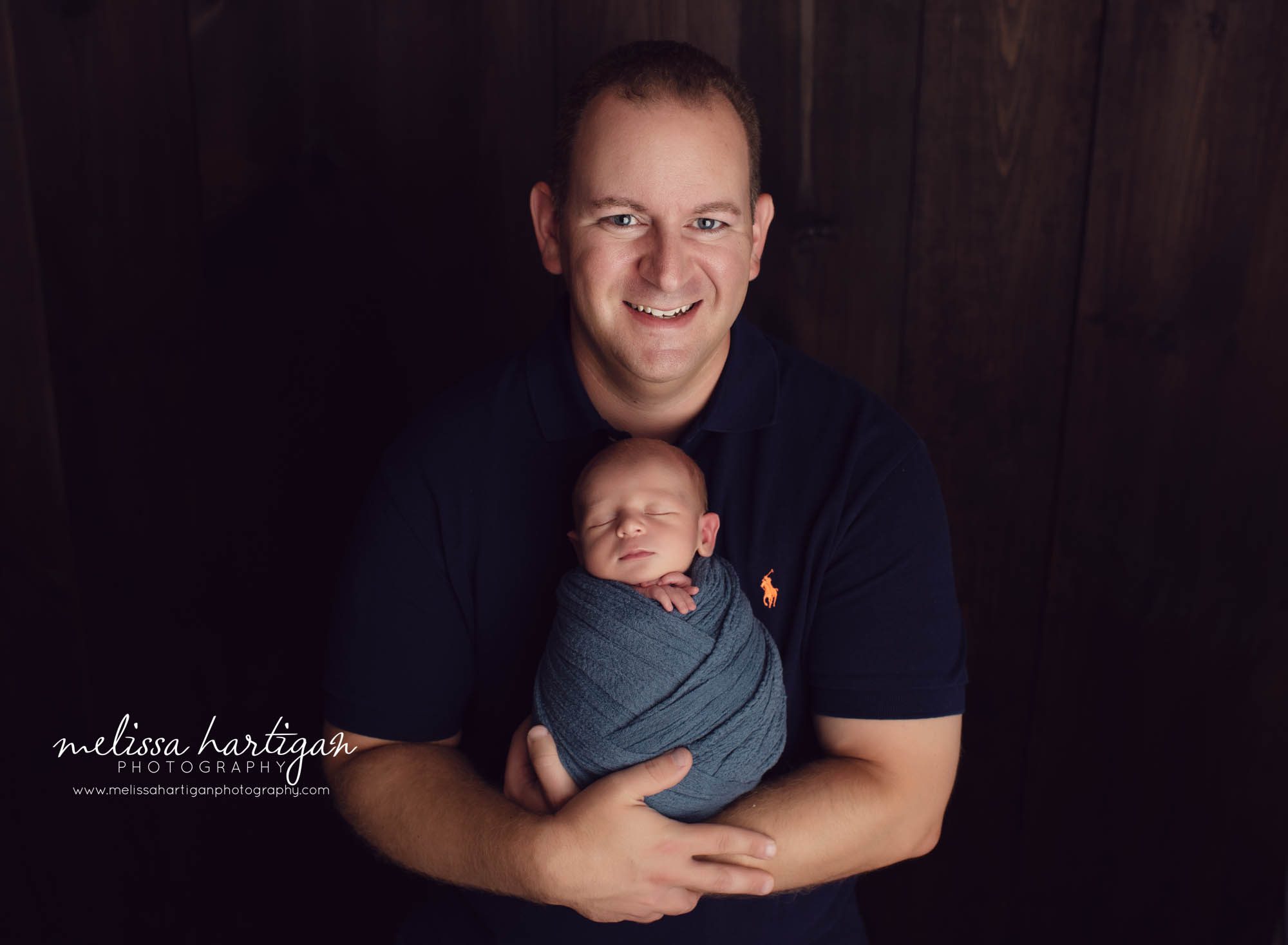 baby boy and dad pose studio newborn photography