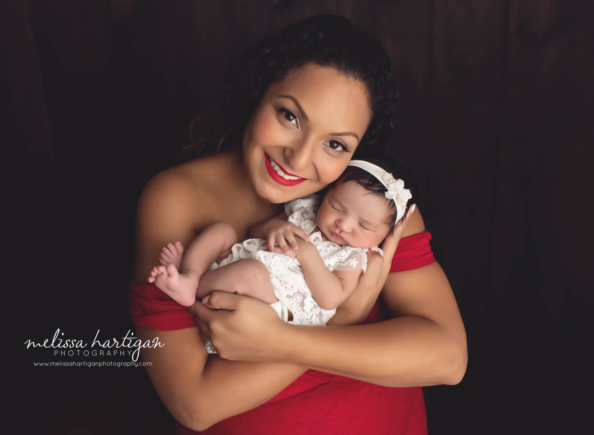 new mom holding her newborn baby girl CT newborn photography