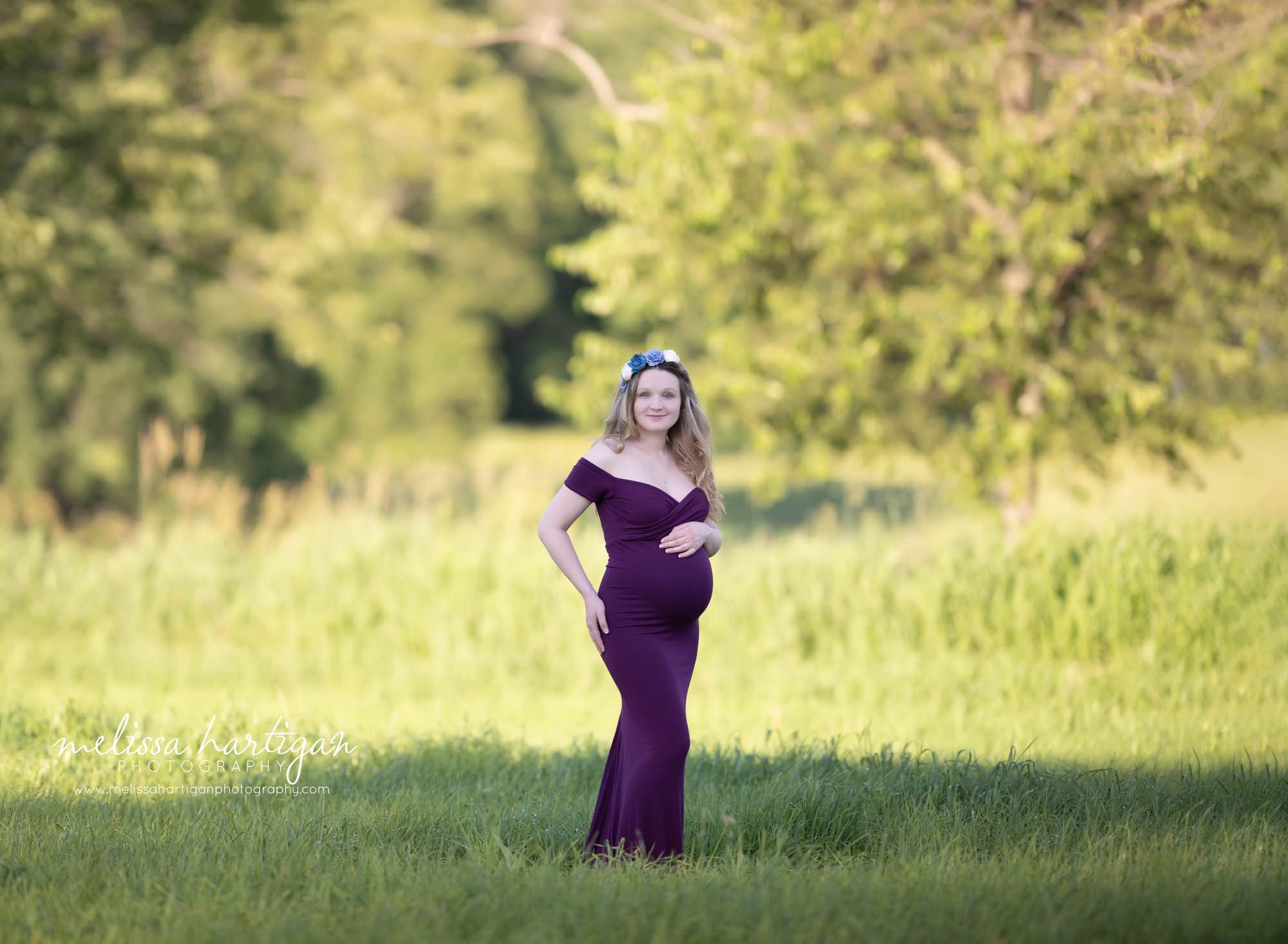 expectant mom-to-be wearing love fitted purple gown Maternity photographer CT