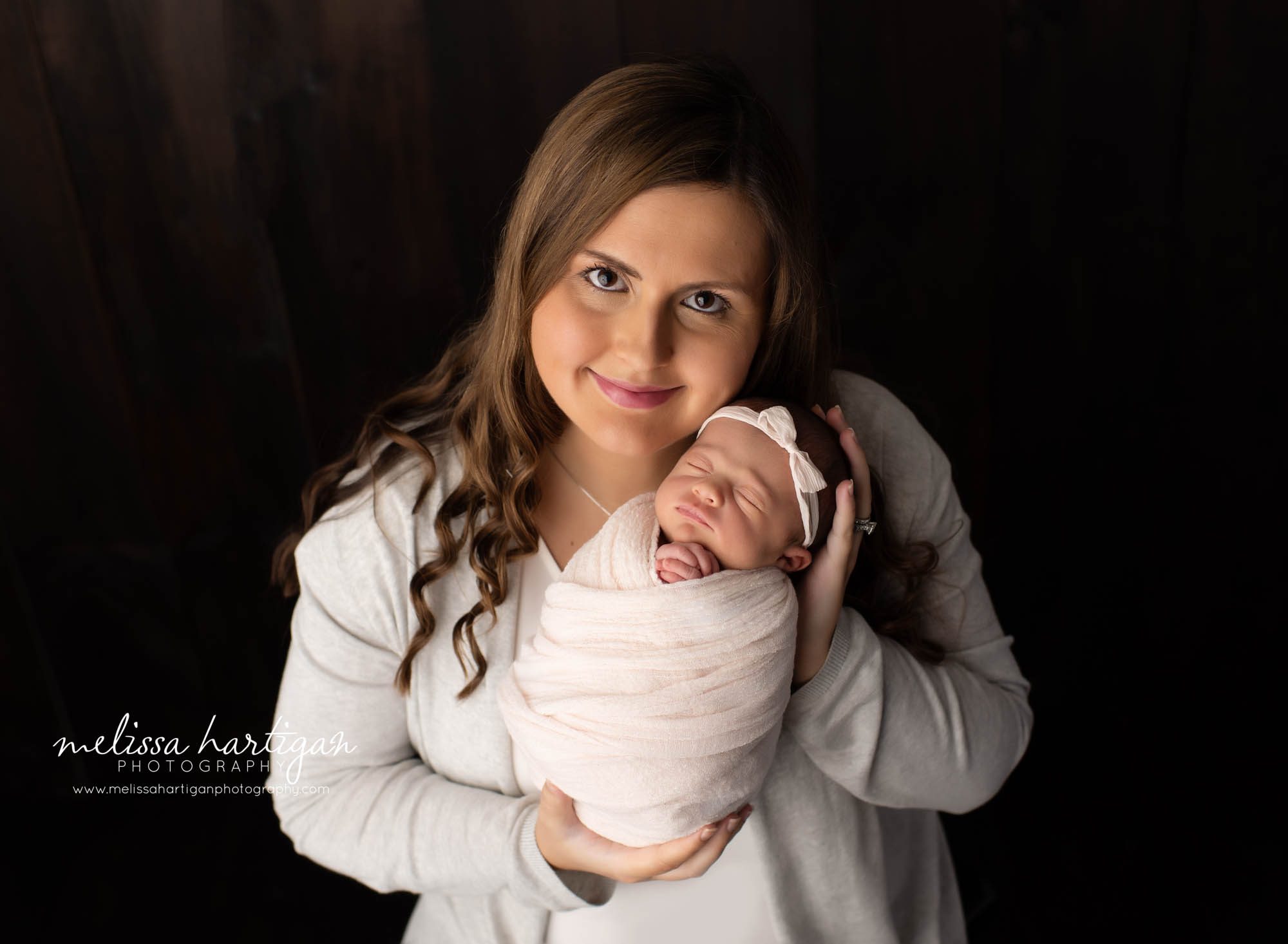 mom and baby girl standing pose in studio newborn photo session CT Photographer