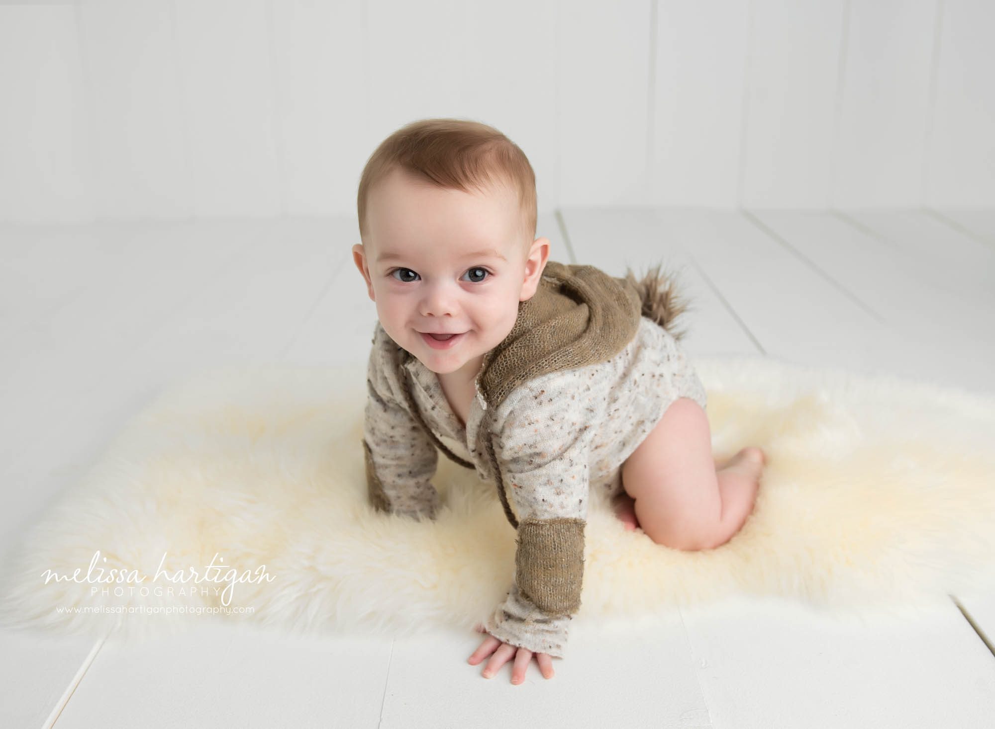 baby boy crawling in photography studio baby milestone photo session CT