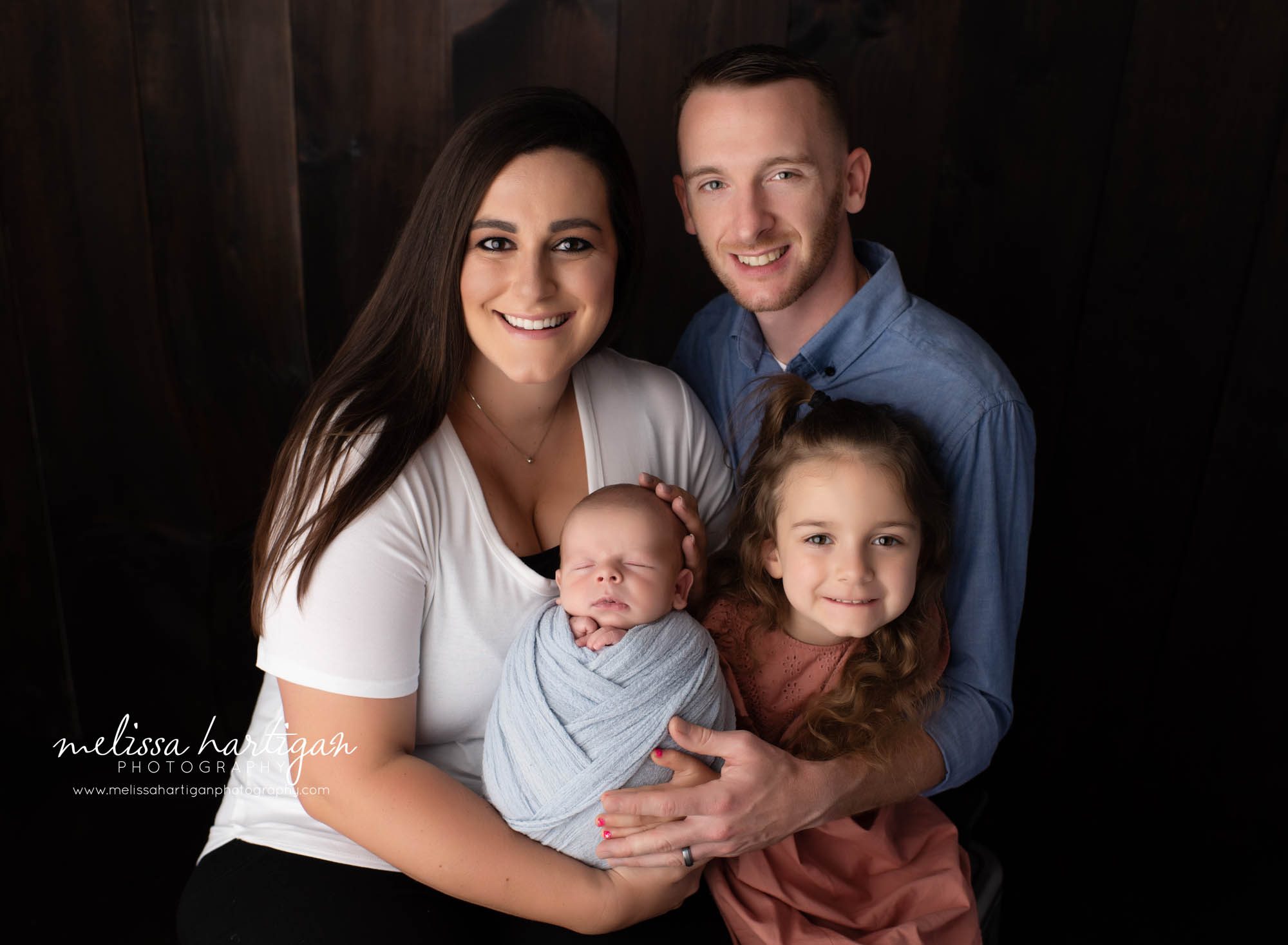 mom dad sibling big sister and newborn boy family photography pose CT Newborn Photographer