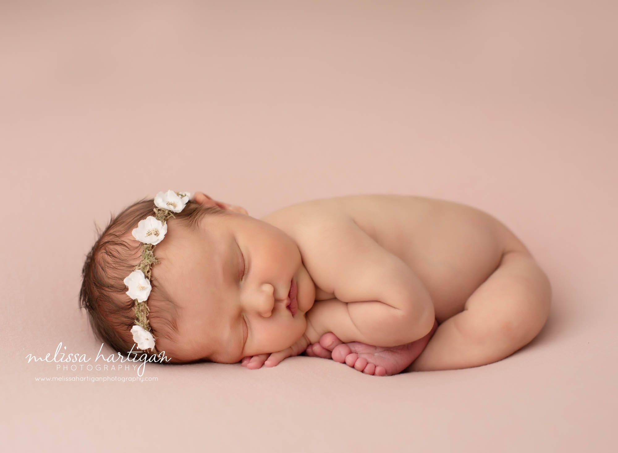 baby girl posed taco pose in newborn photography pose studio session Connecticut Newborn Photographer