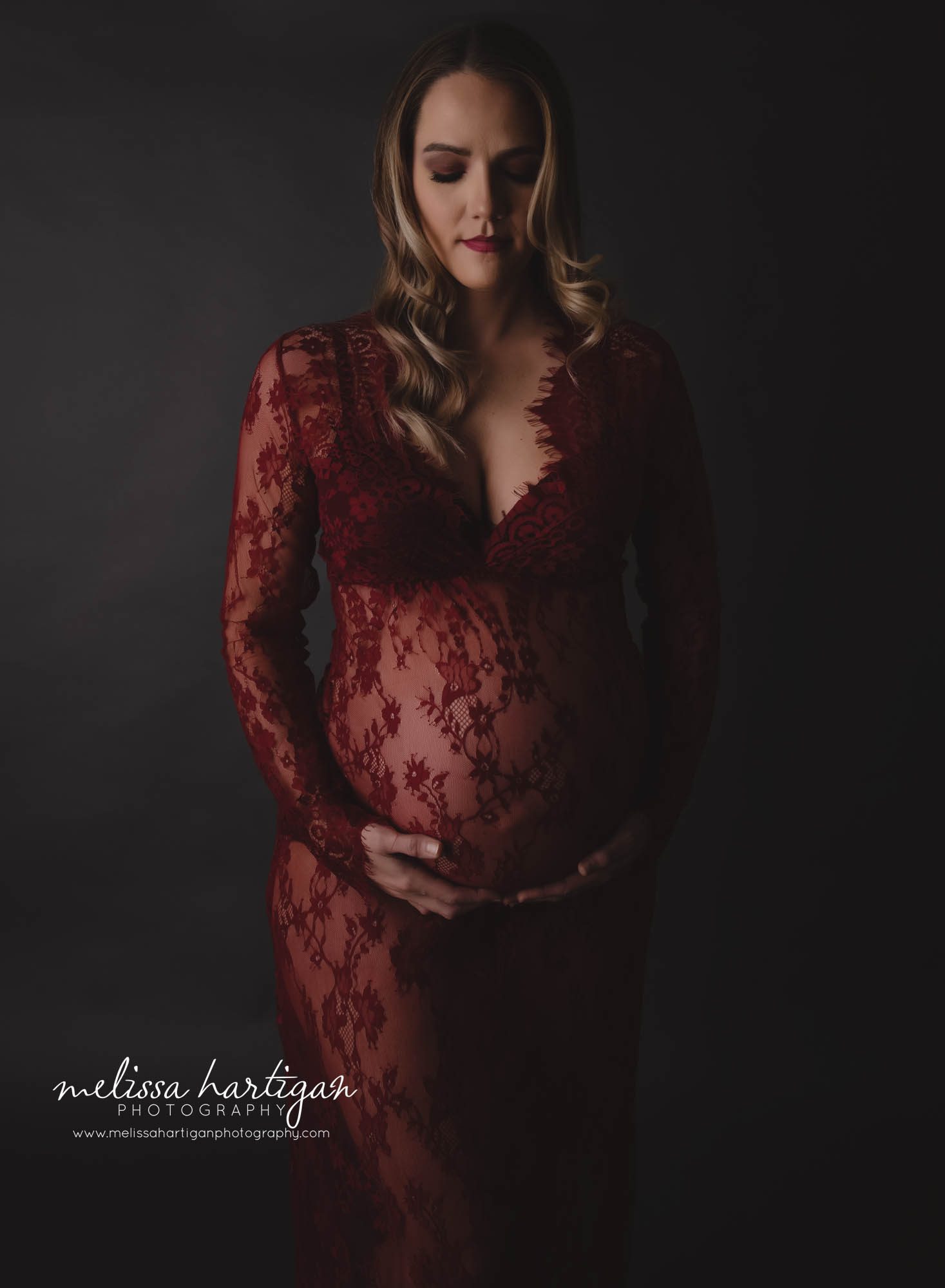 pregnant mom standing maternity photography pose red lace maternity gown Connecticut maternity photography