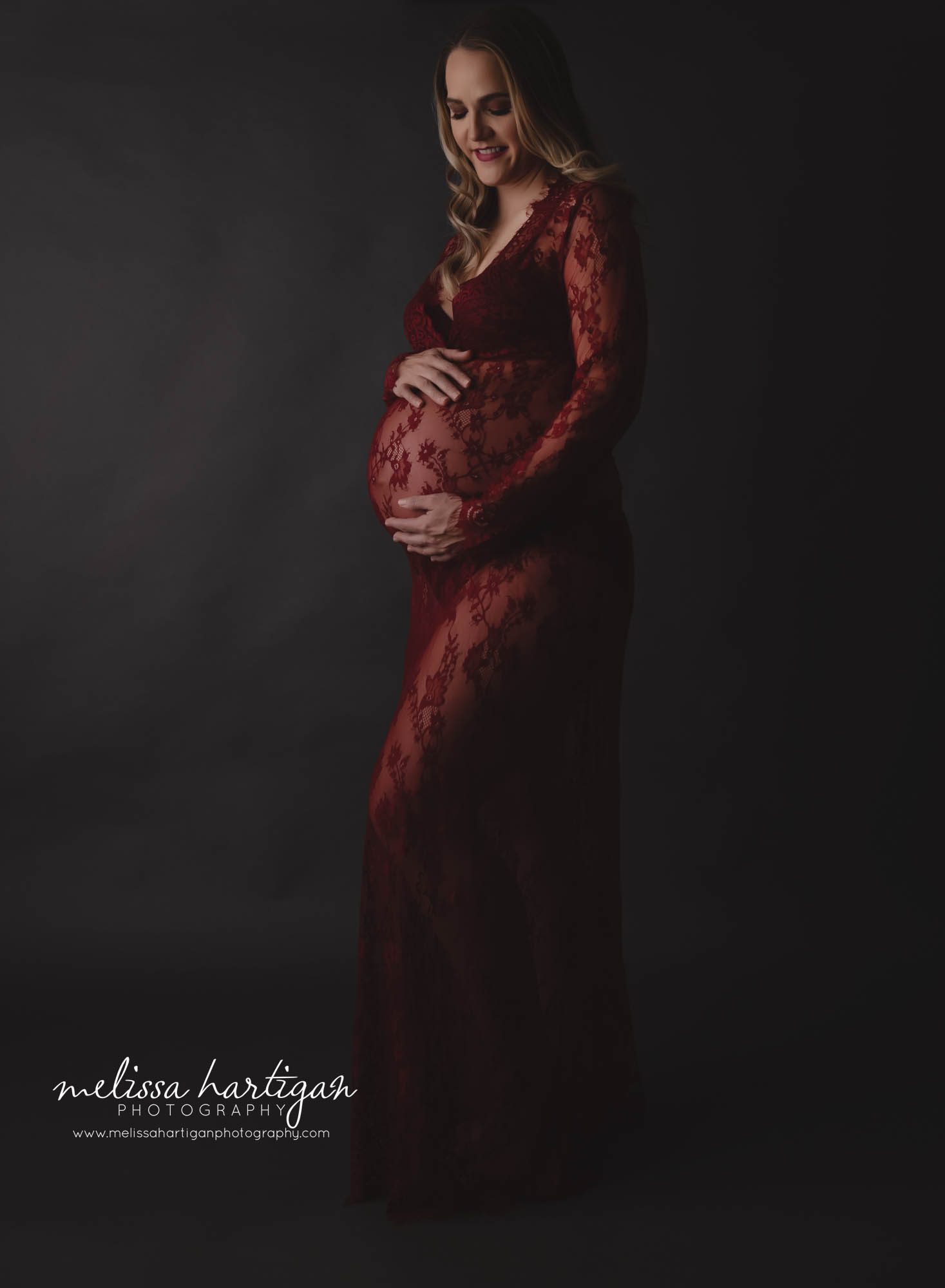 pregnant mom standing maternity photography pose red lace maternity gown Connecticut maternity photographer