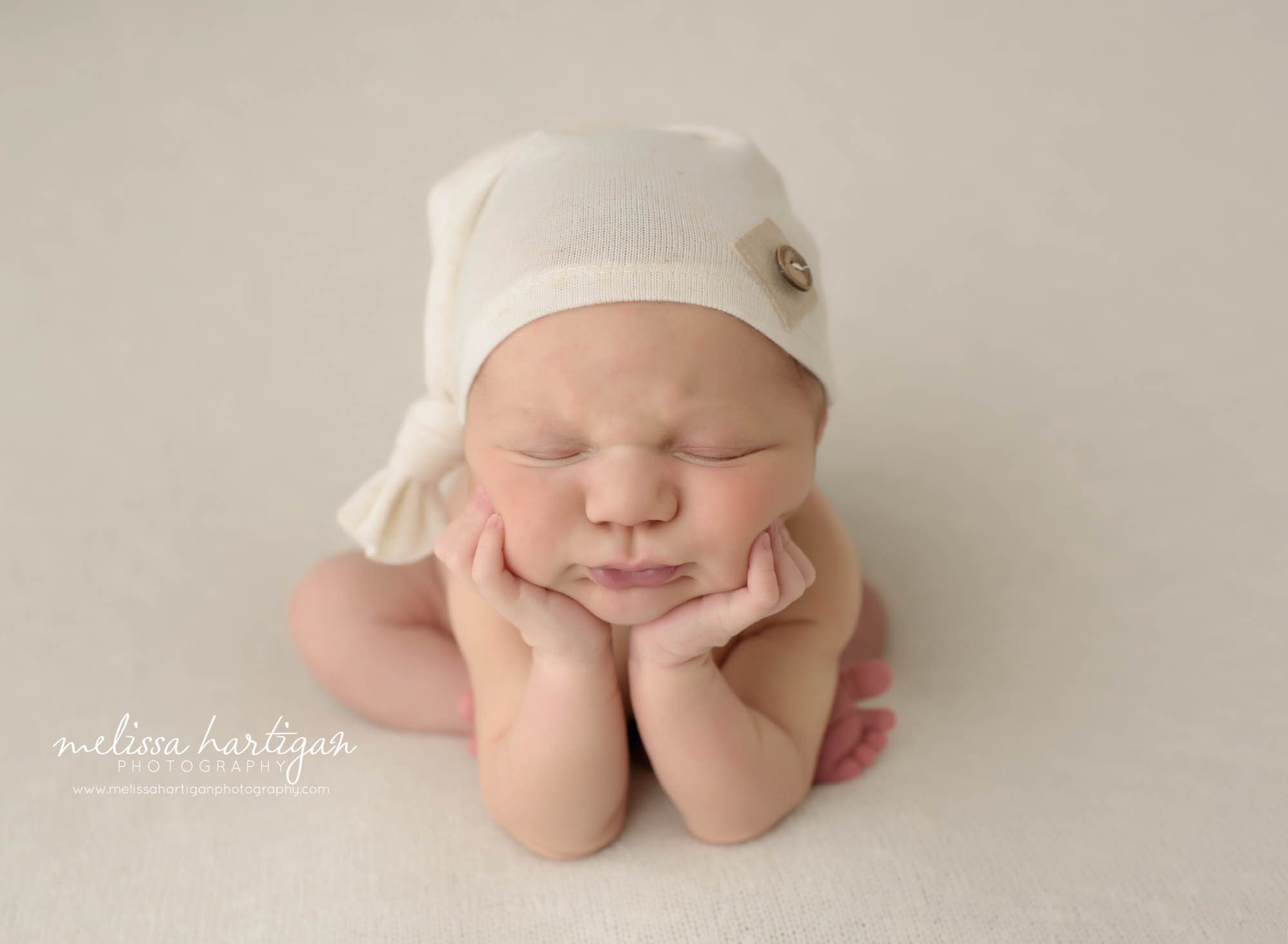 newborn baby boy posed in groggy pose CT newborn Photographer