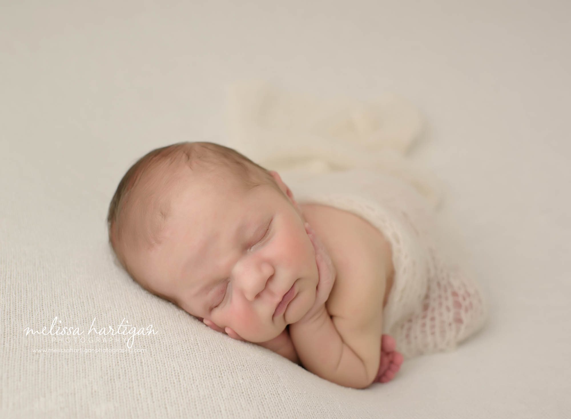 newborn baby boy posed in timber pose Connecticut newborn photography session