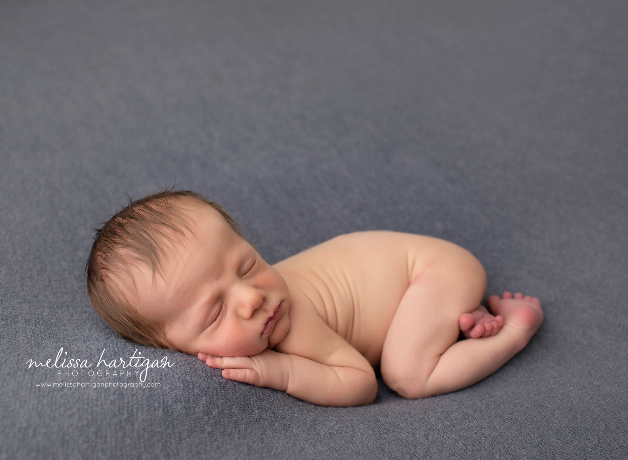 Baby boy posed on tummy studio newborn session CT baby photographer