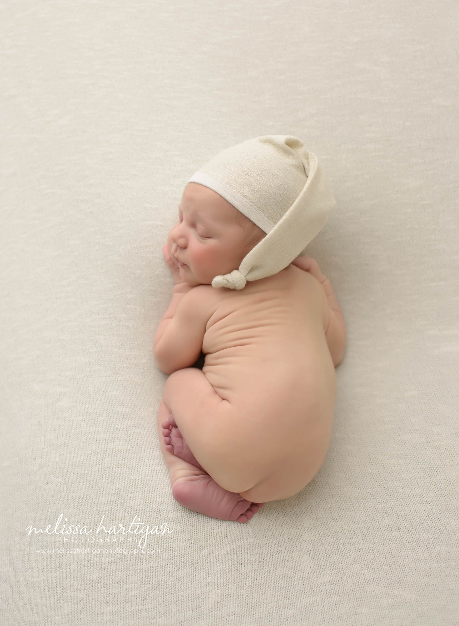 newborn baby sleeping on tummy posed in newborn photography pose CT photographer