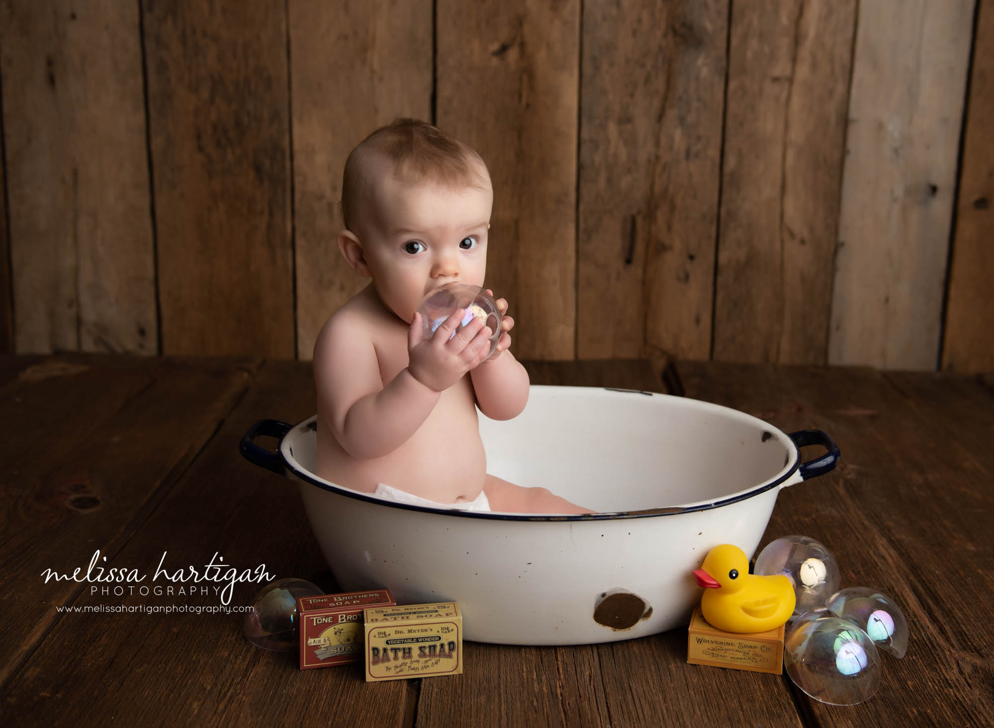 baby boy sitting baby bath prop eating bubble CT baby milestone photography