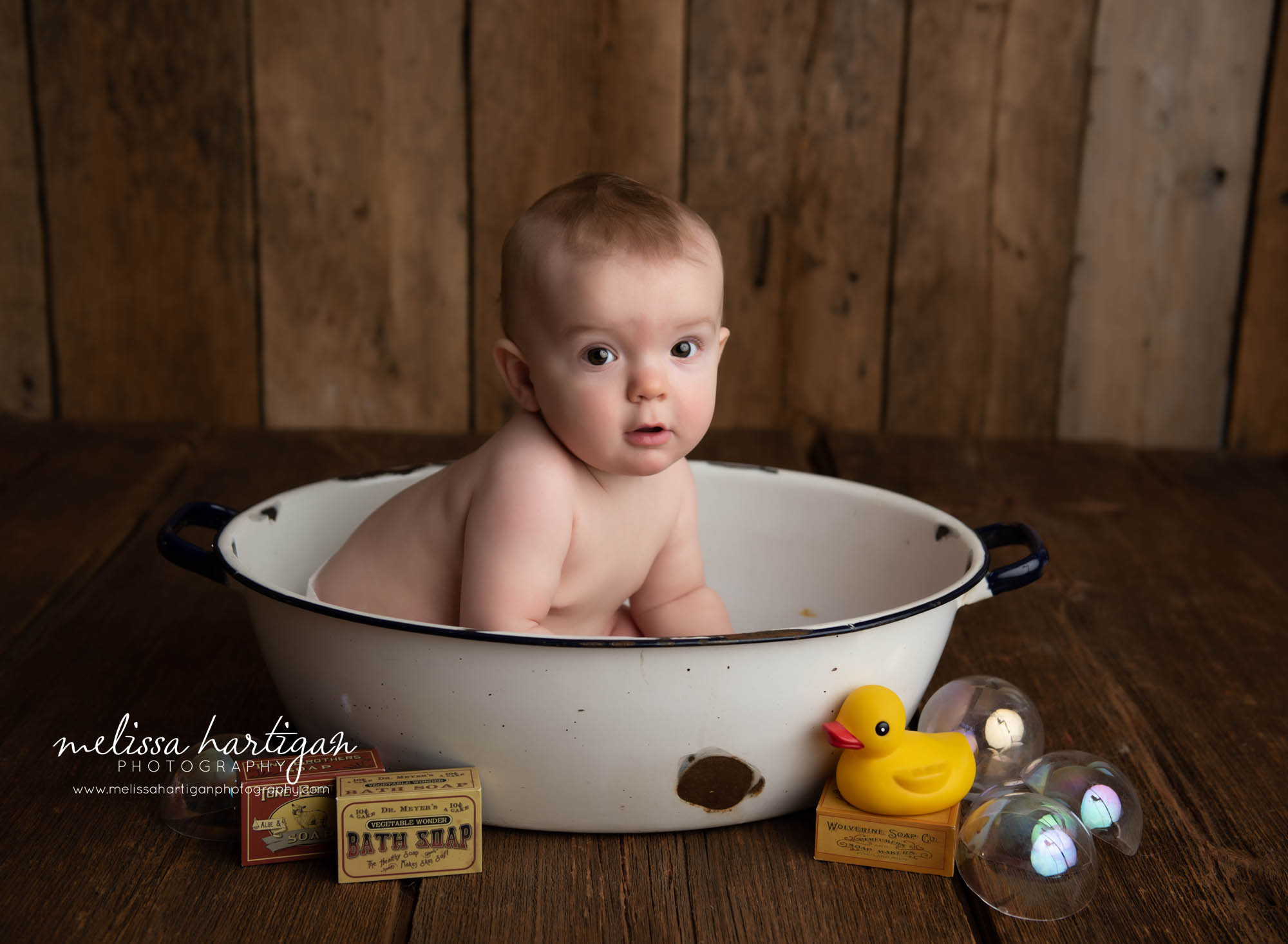 baby boy sitting in prop Connecticut baby photographer