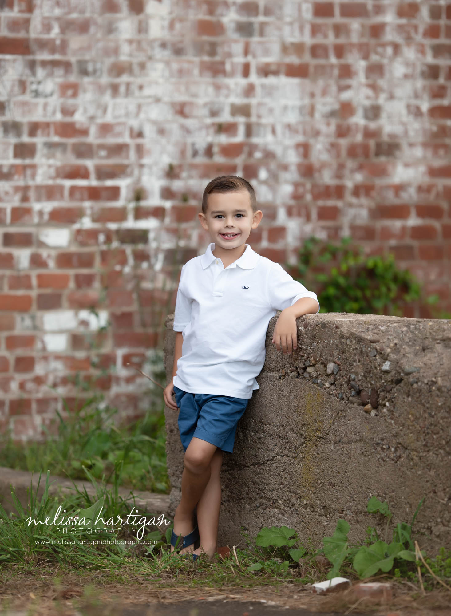 young son standing pose family photography session CT family Photographer
