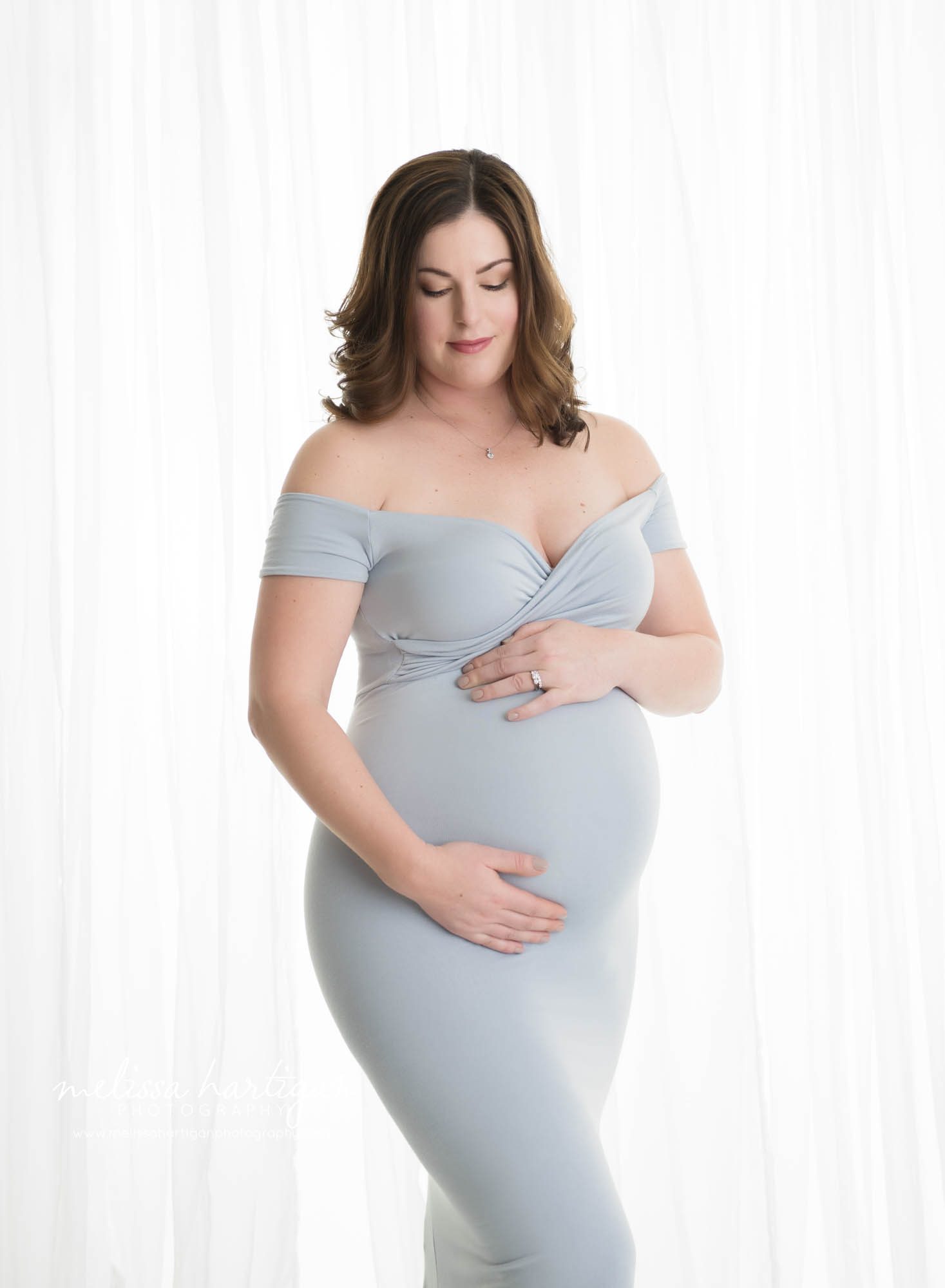 pregnant mom wearing blue dress studio maternity photography tolland CT
