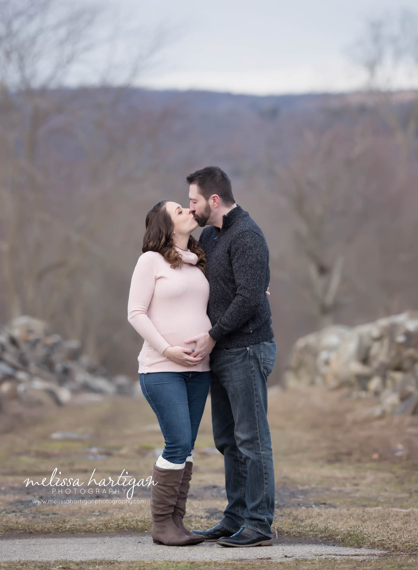 pregnant mom and dad-to-be kissing maternity photography Connecticut