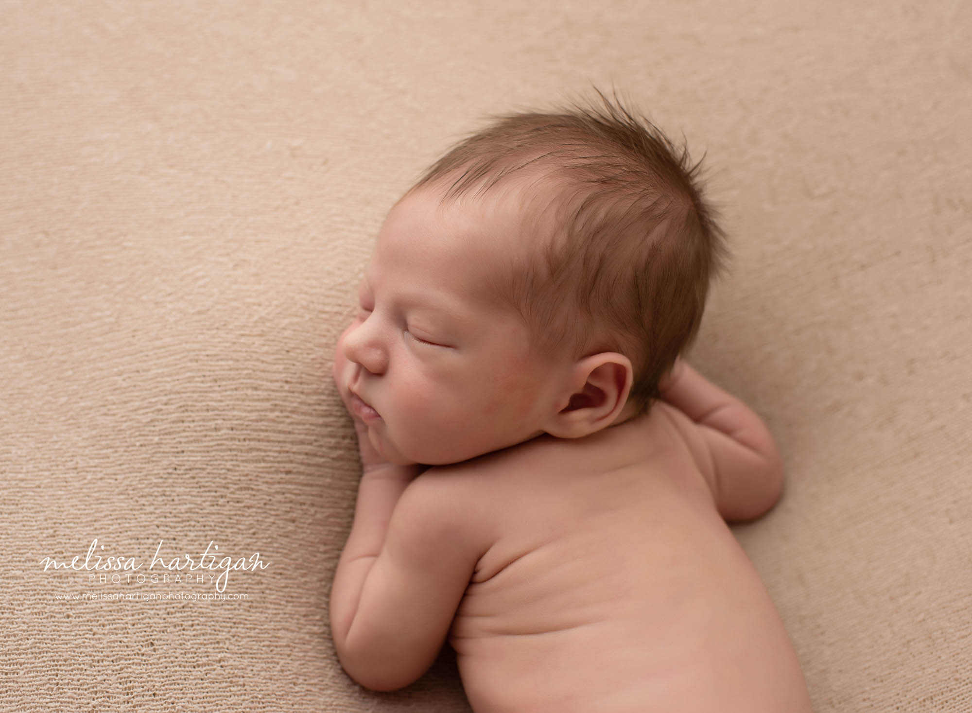 newborn baby boy posed on side Newborn Photography CT