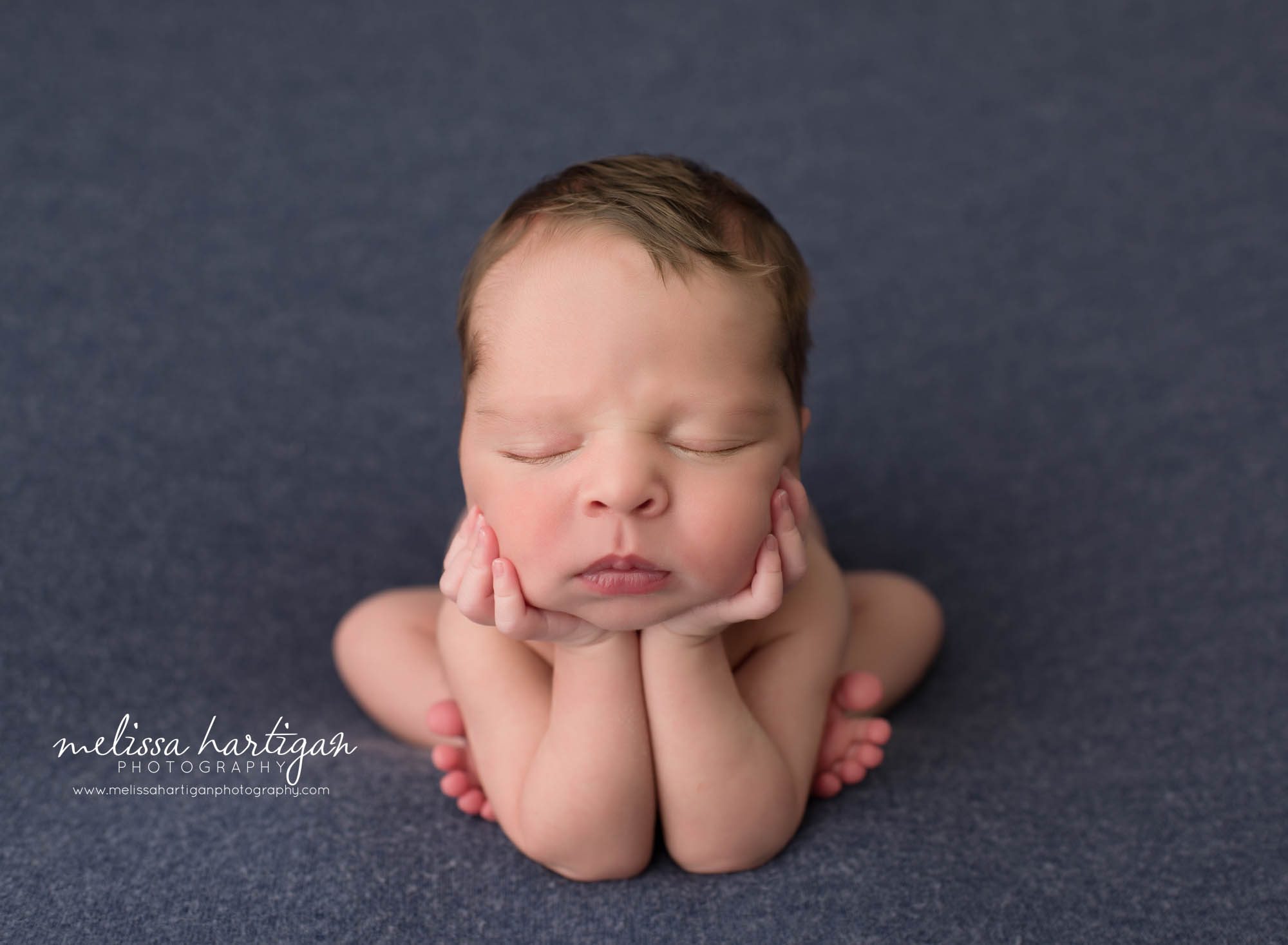 newborn baby boy posed in froggy pose Newborn Photography East Hartford CT