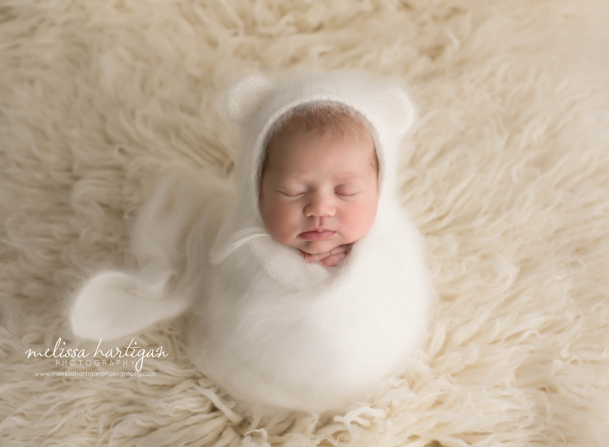 newborn baby girl wrappe din white knit wrap with bear bonnet