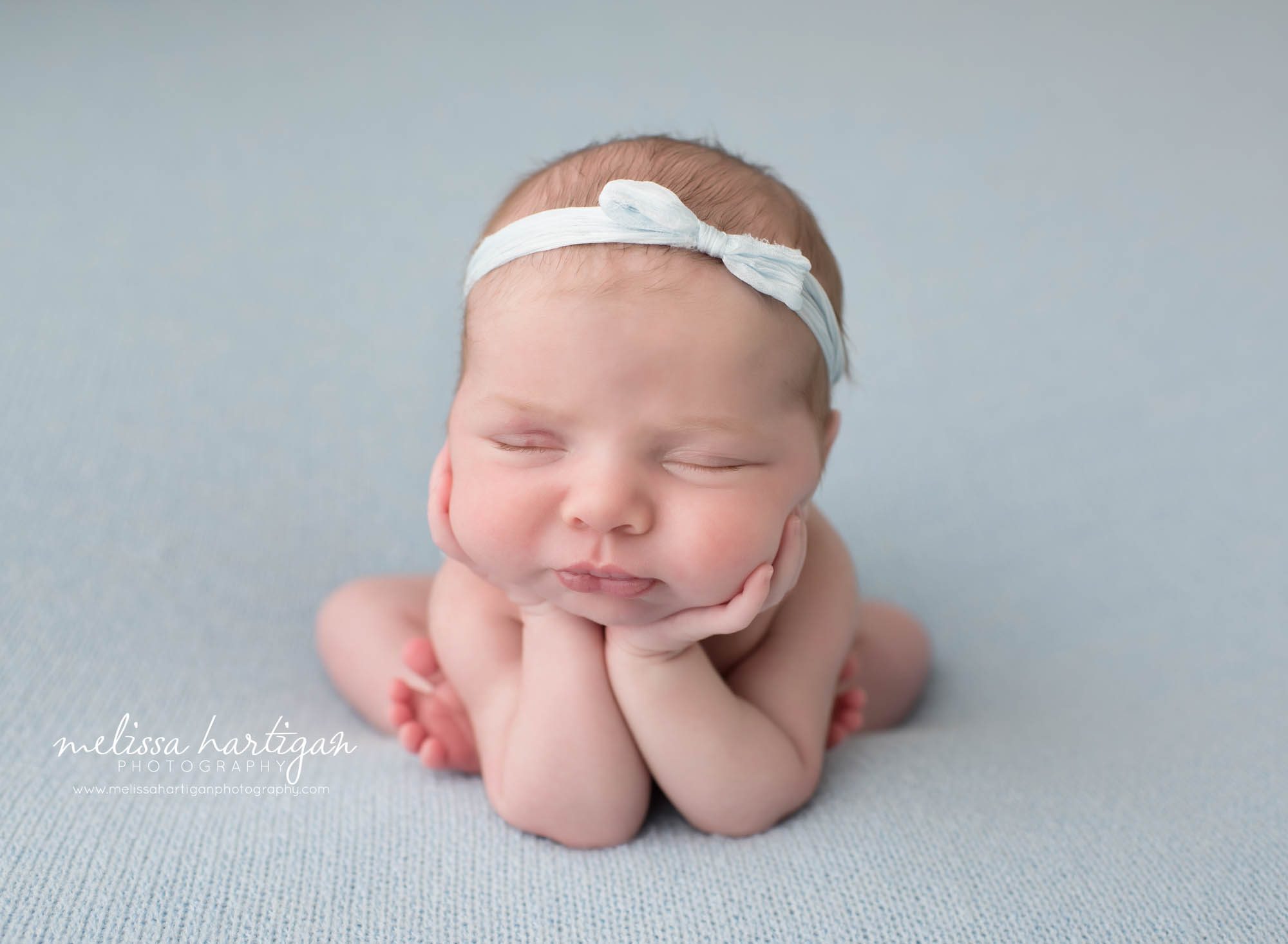 Newborn baby girl posed froggy pose newborn photography CT session
