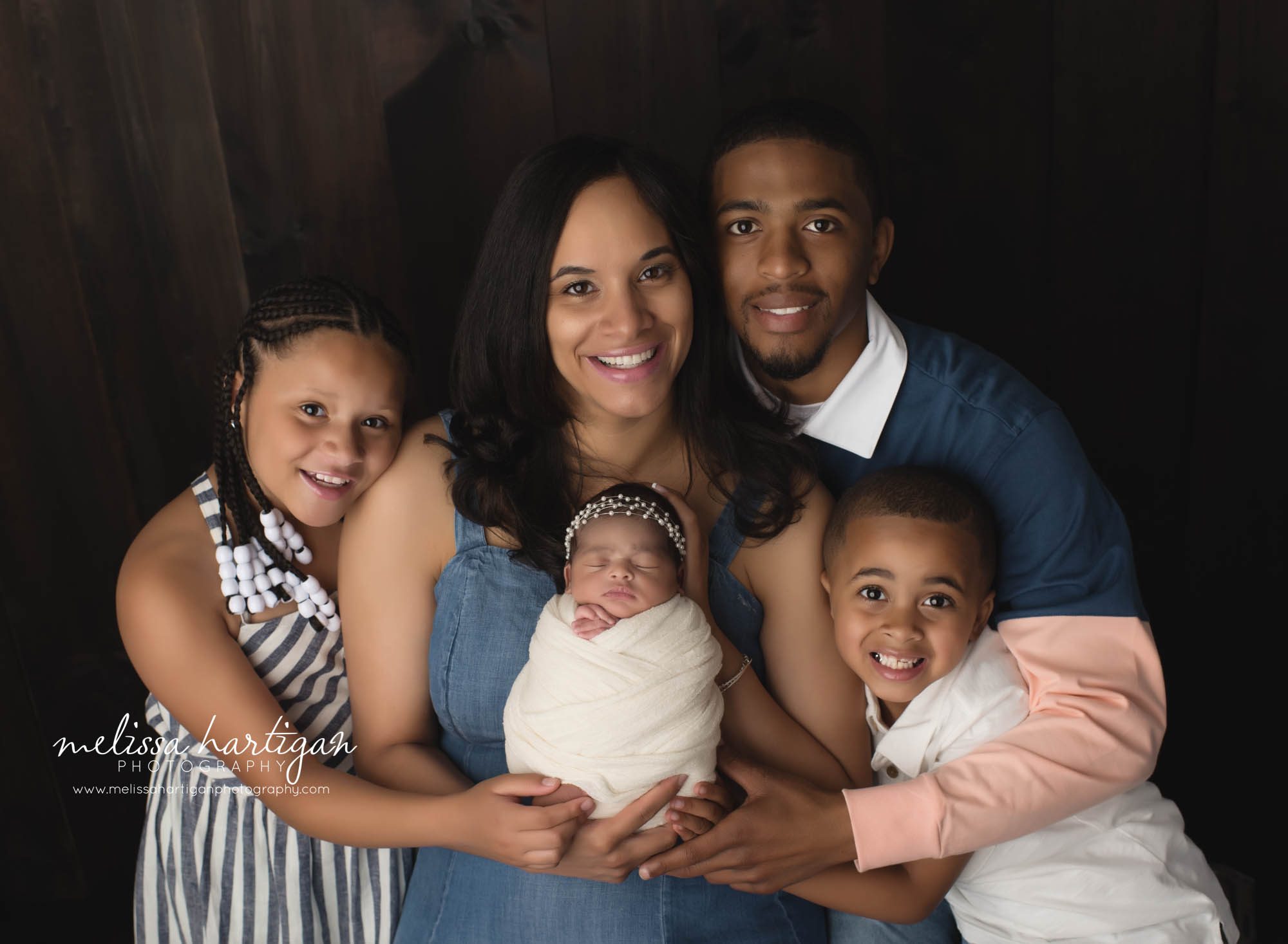 family photo mom dad big sister big brother and newborn baby girl Connecticut Newborn Photographer