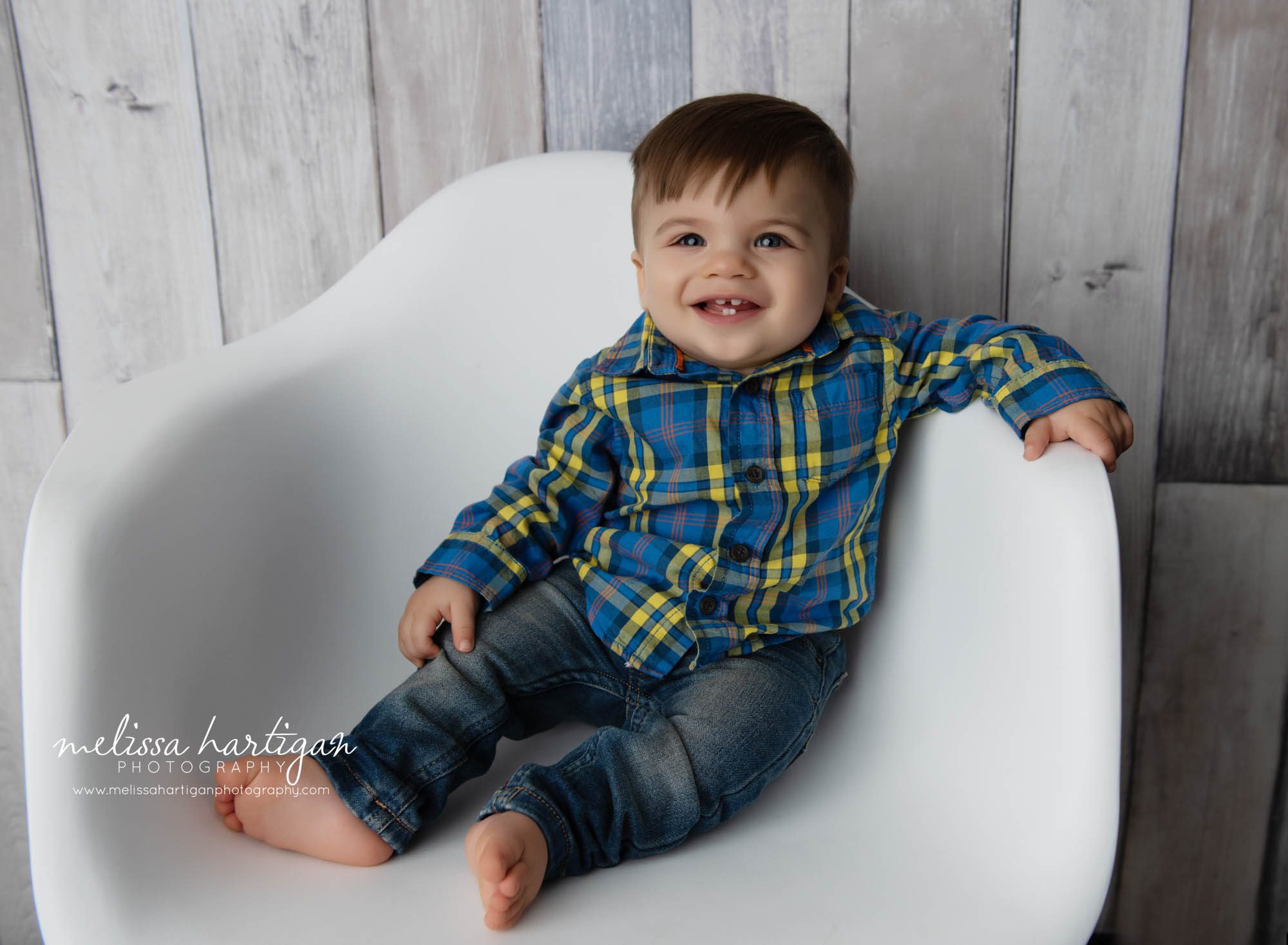 baby boy smiling during baby milestone studio photography session Amstony CT baby photography