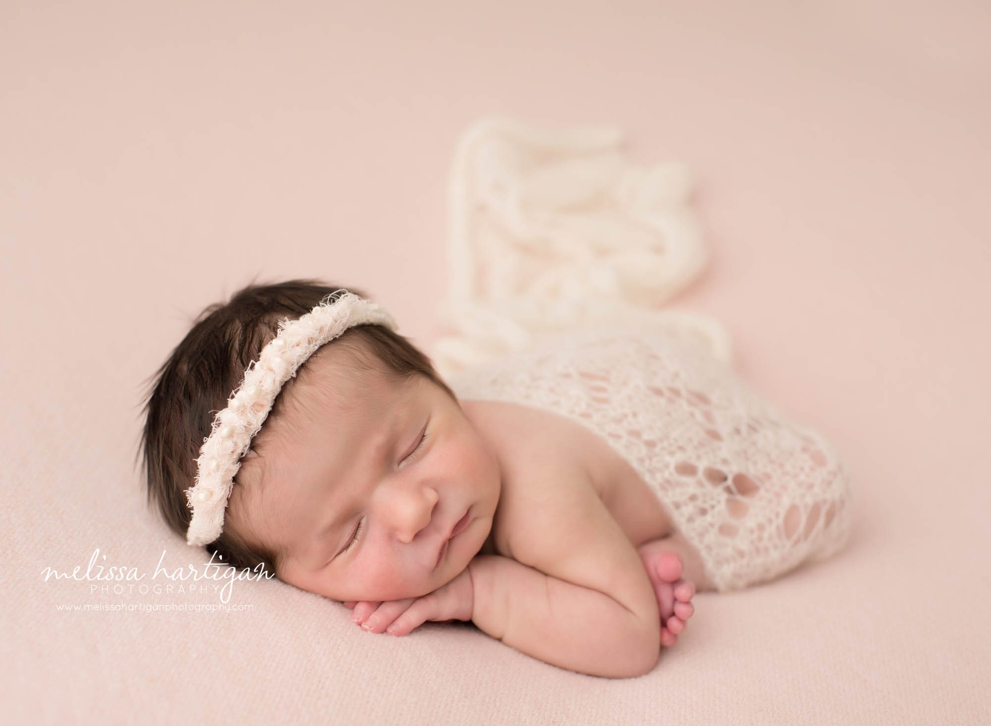 Newborn baby girl posed taco pose with cream knitted layer Ct maternity newborn photographer