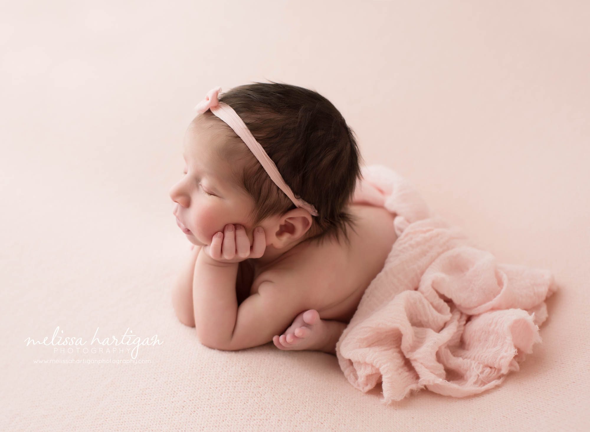 baby girl posed side froggy newborn photography pose
