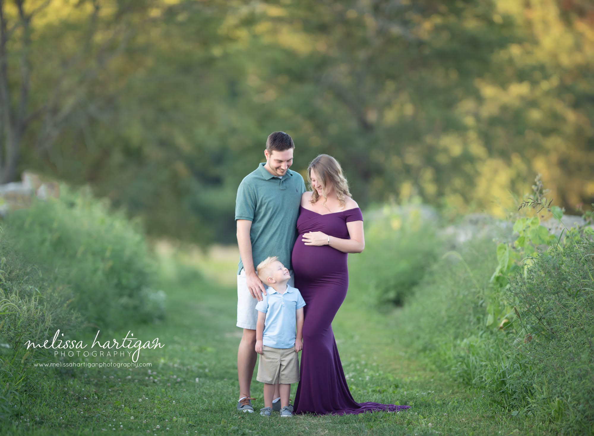 mom dad and toddler son family style maternity photography picture Connecticut maternity photographer melissa hartigan photography