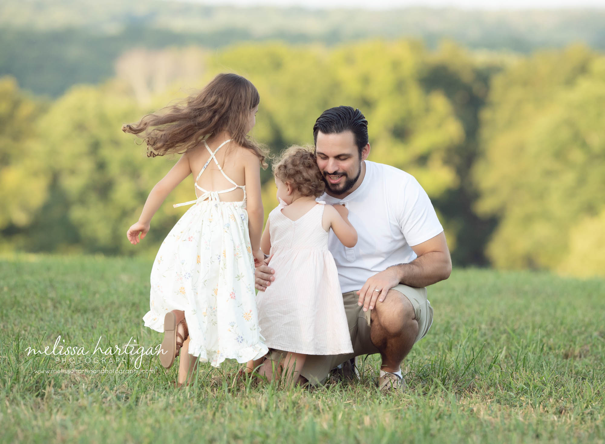 dad with daughters outside family photography family photographer west hartford ct