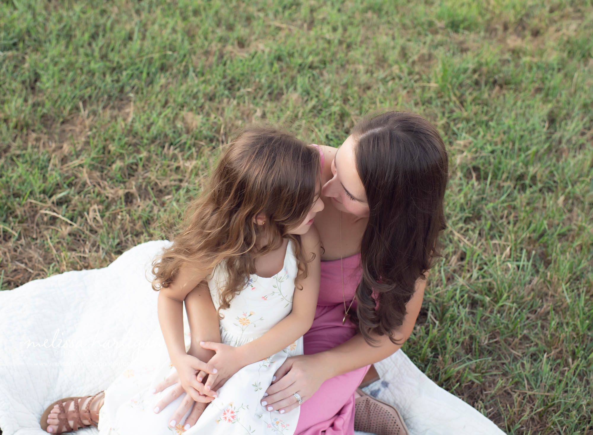 mom with daughter sitting on blanket connection family photography west hartford CT family Photographer
