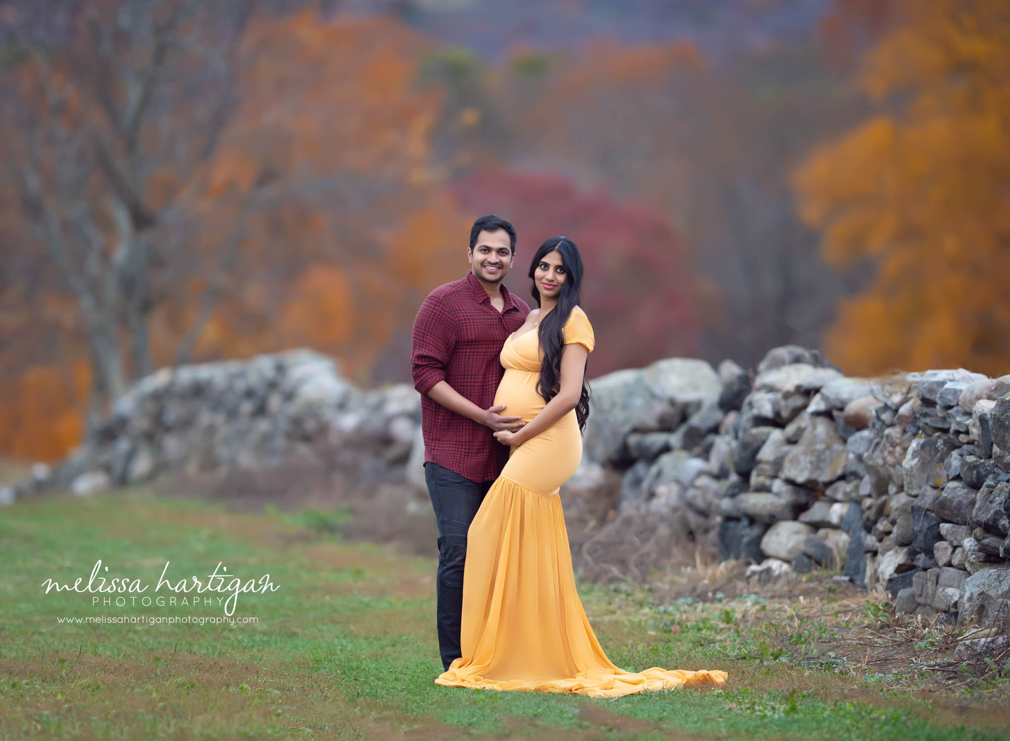 couple standing maternity picture outdoors long form fitting maternity gown Best maternity Photography CT