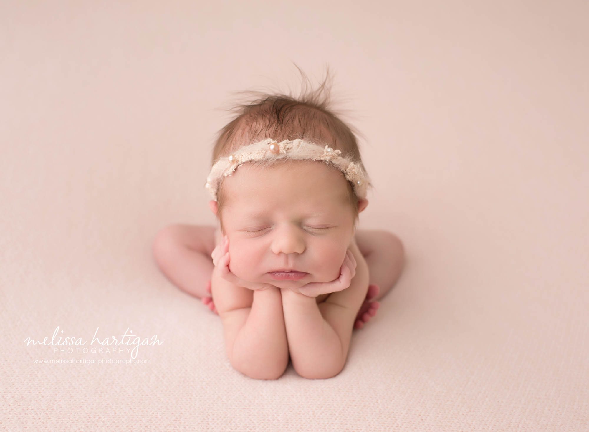 newborn baby girl posed froggy pose newborn photography massachusetts